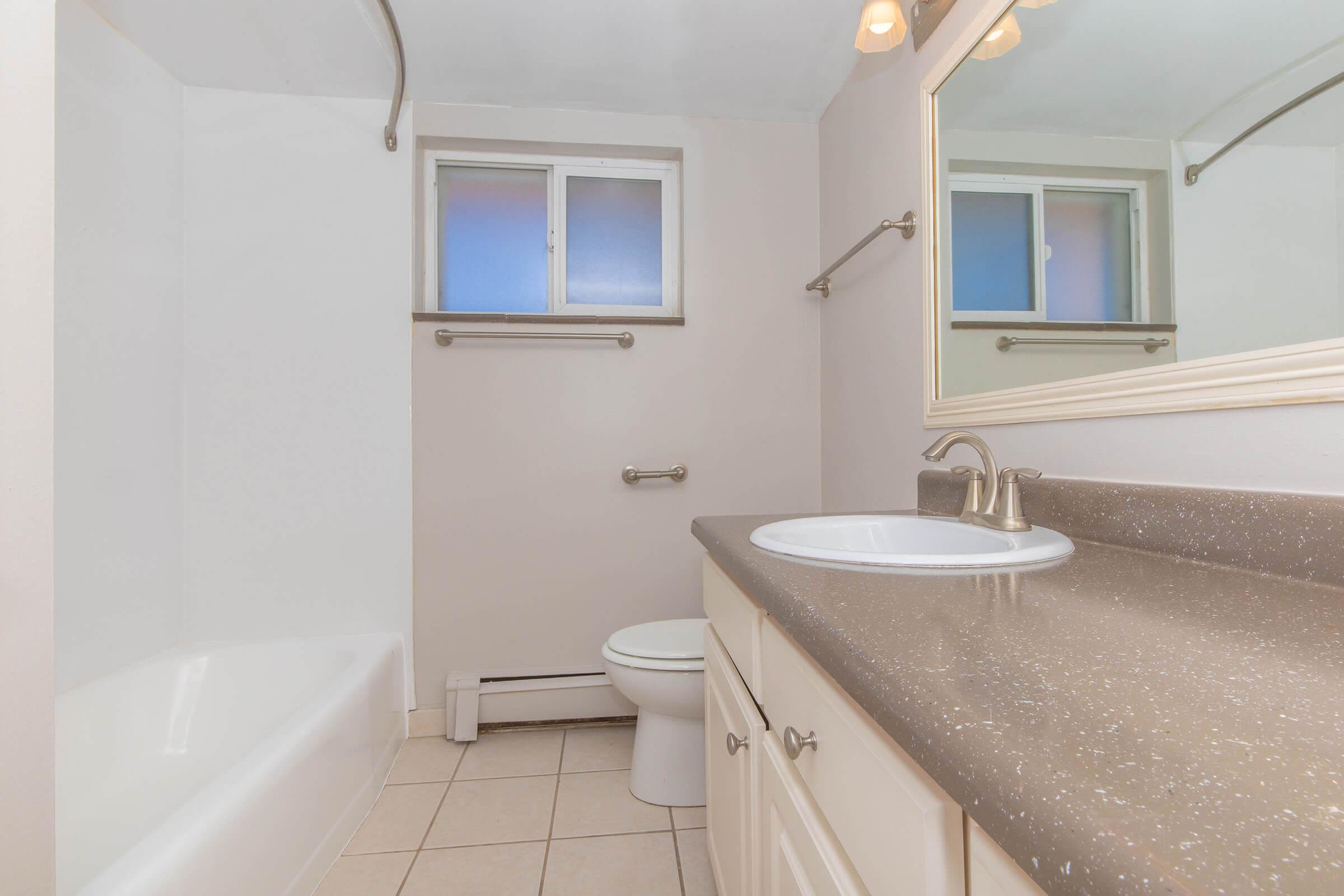 Bathroom with tub at Boulder Crescent in Colorado Springs, Colorado