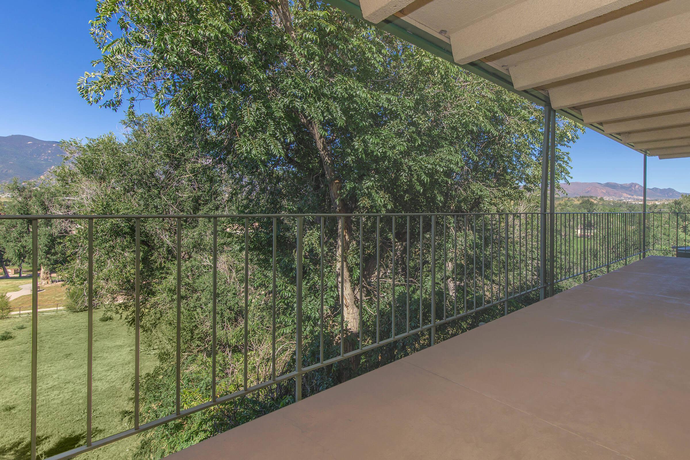 Balcony with greenery at Boulder Crescent in Colorado Springs, Colorado