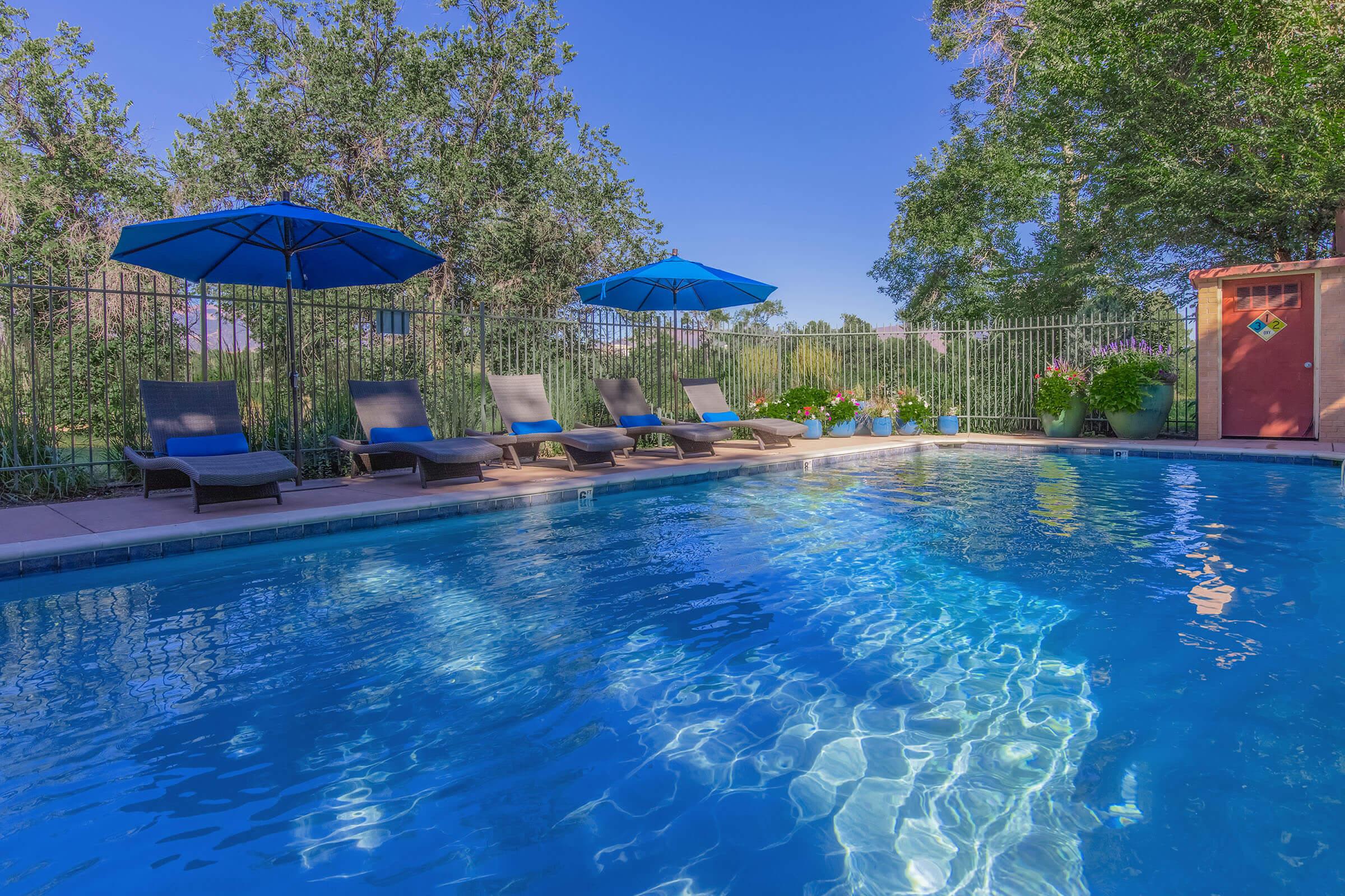 Pool and umbrellas at Boulder Crescent in Colorado Springs, Colorado