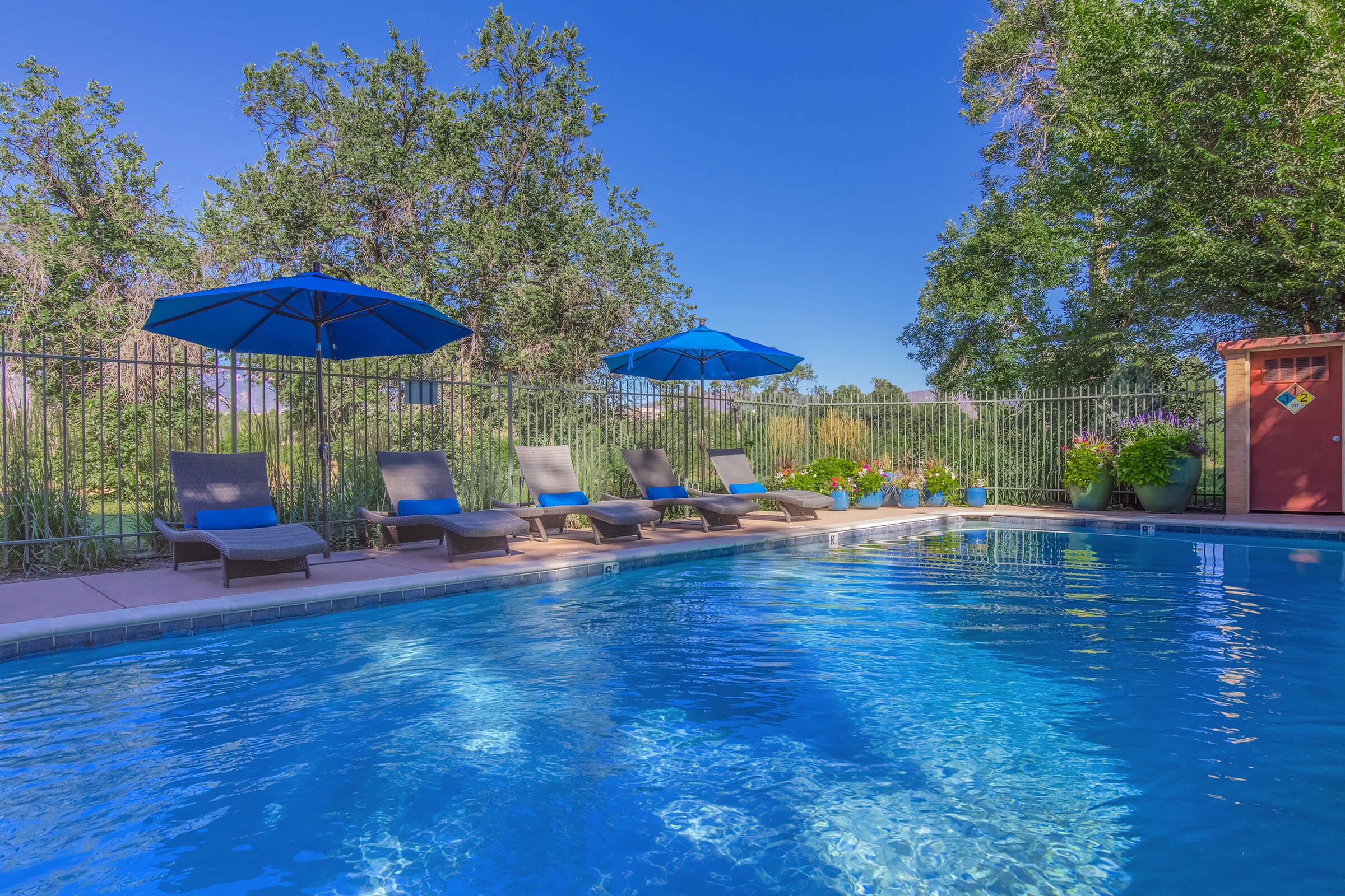 Pool with tables at Boulder Crescent in Colorado Springs, Colorado