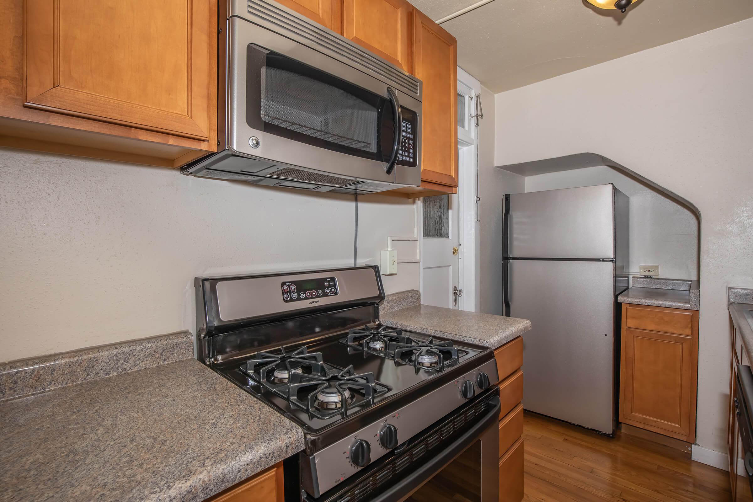 Kitchen with stainless-steel fridge at Cascade Park in Colorado Springs, Colorado