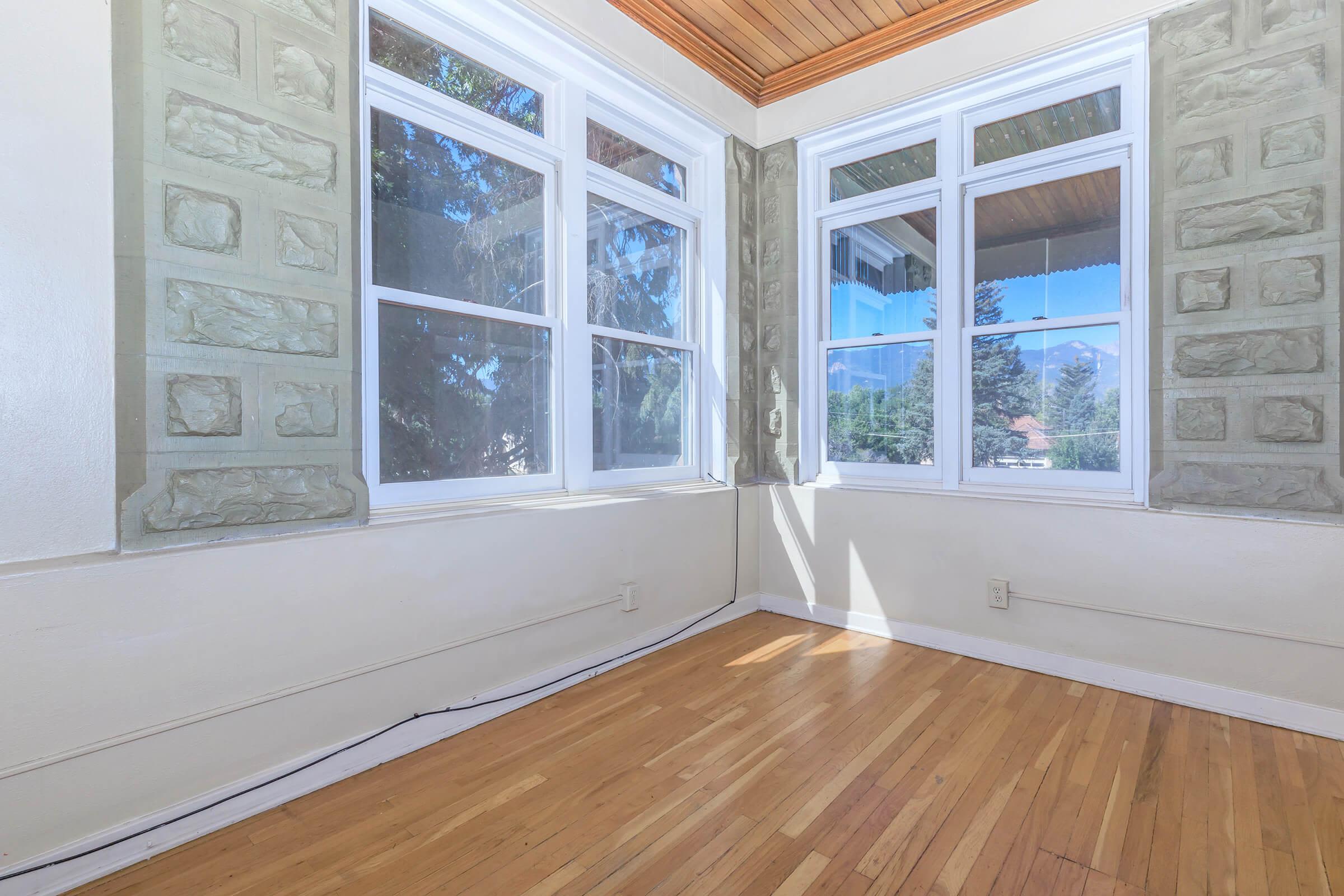 Bedroom with stone accents at Cascade Park in Colorado Springs, Colorado