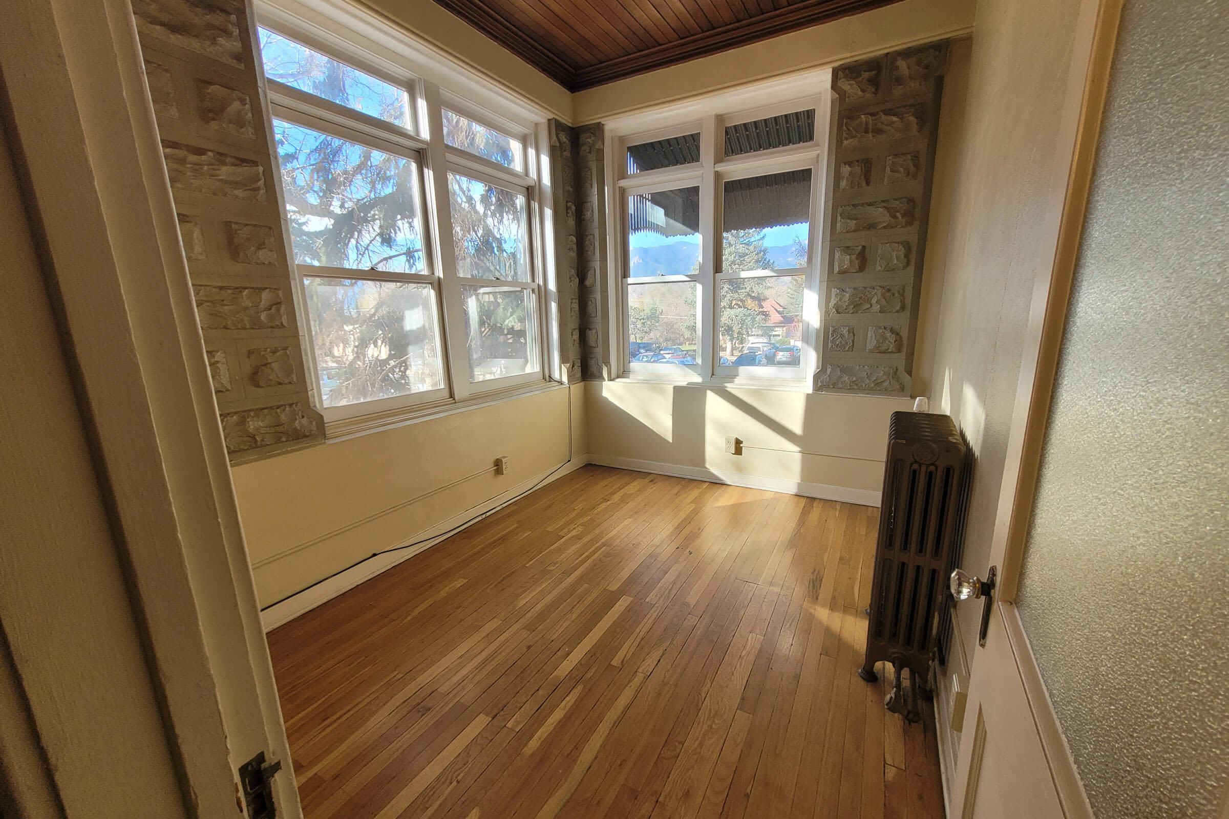 Bedroom with large windows at Cascade Park in Colorado Springs, Colorado