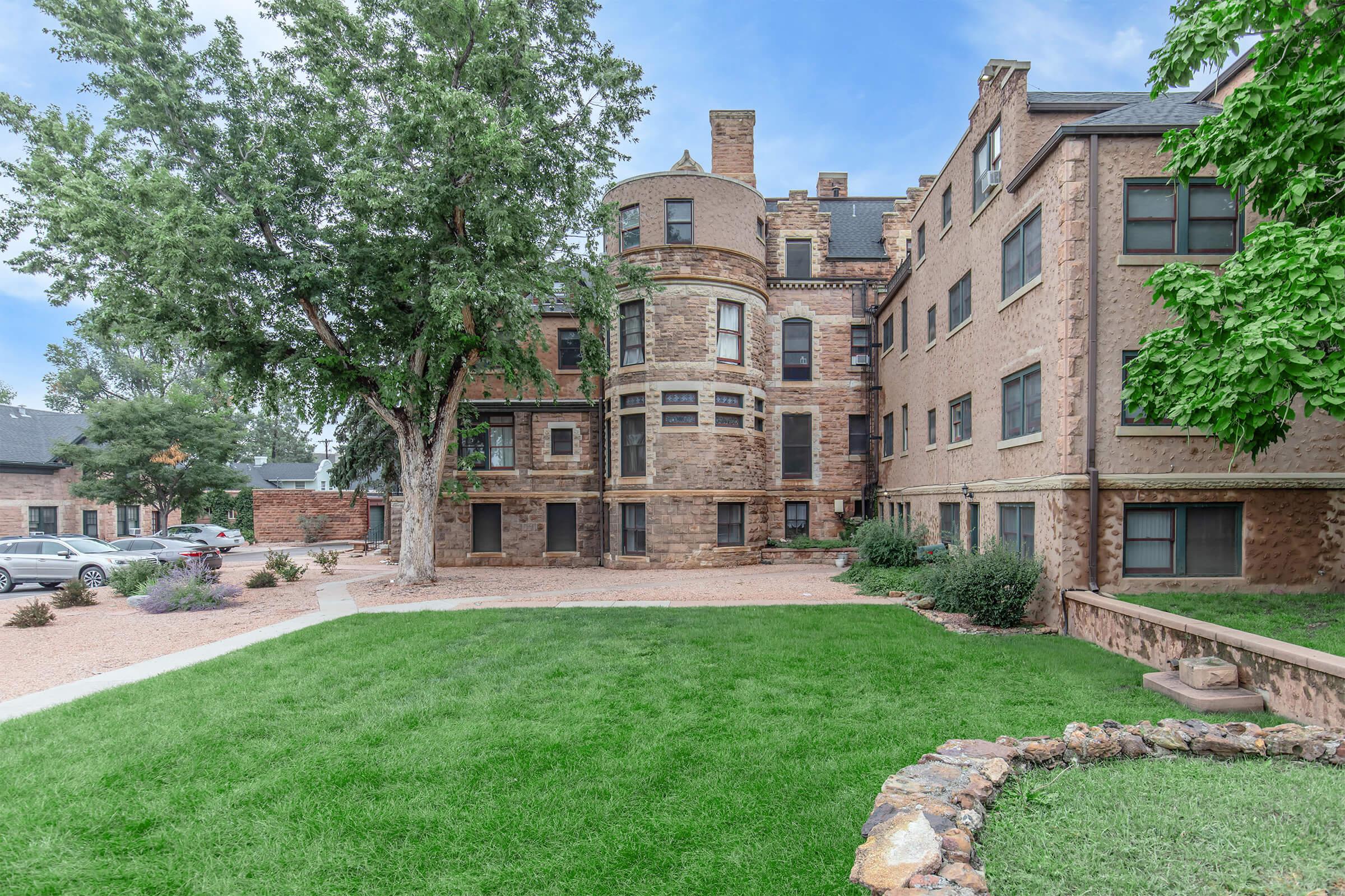 Exterior view of Hagerman Mansion with mature landscaping at Cascade Park in Colorado Springs,Colorado
