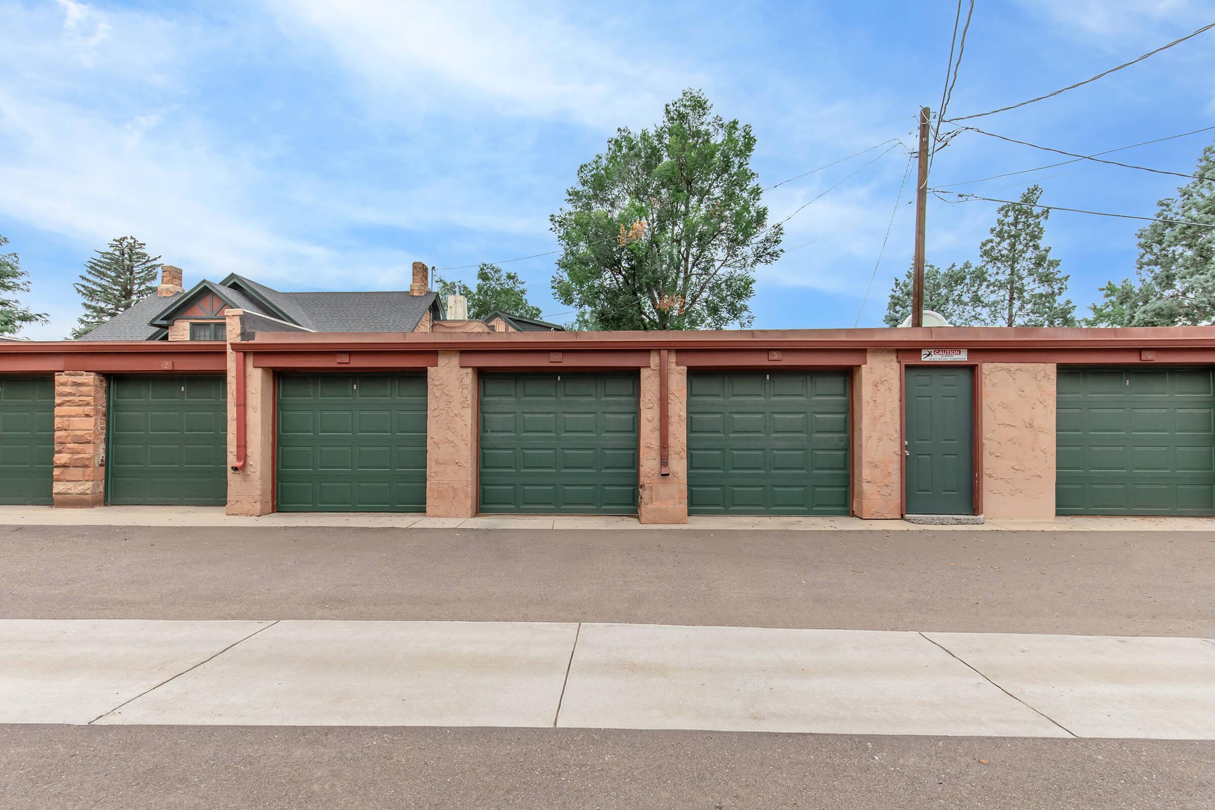 Garages with green doors at Cascade Park in Colorado Springs, Colorado