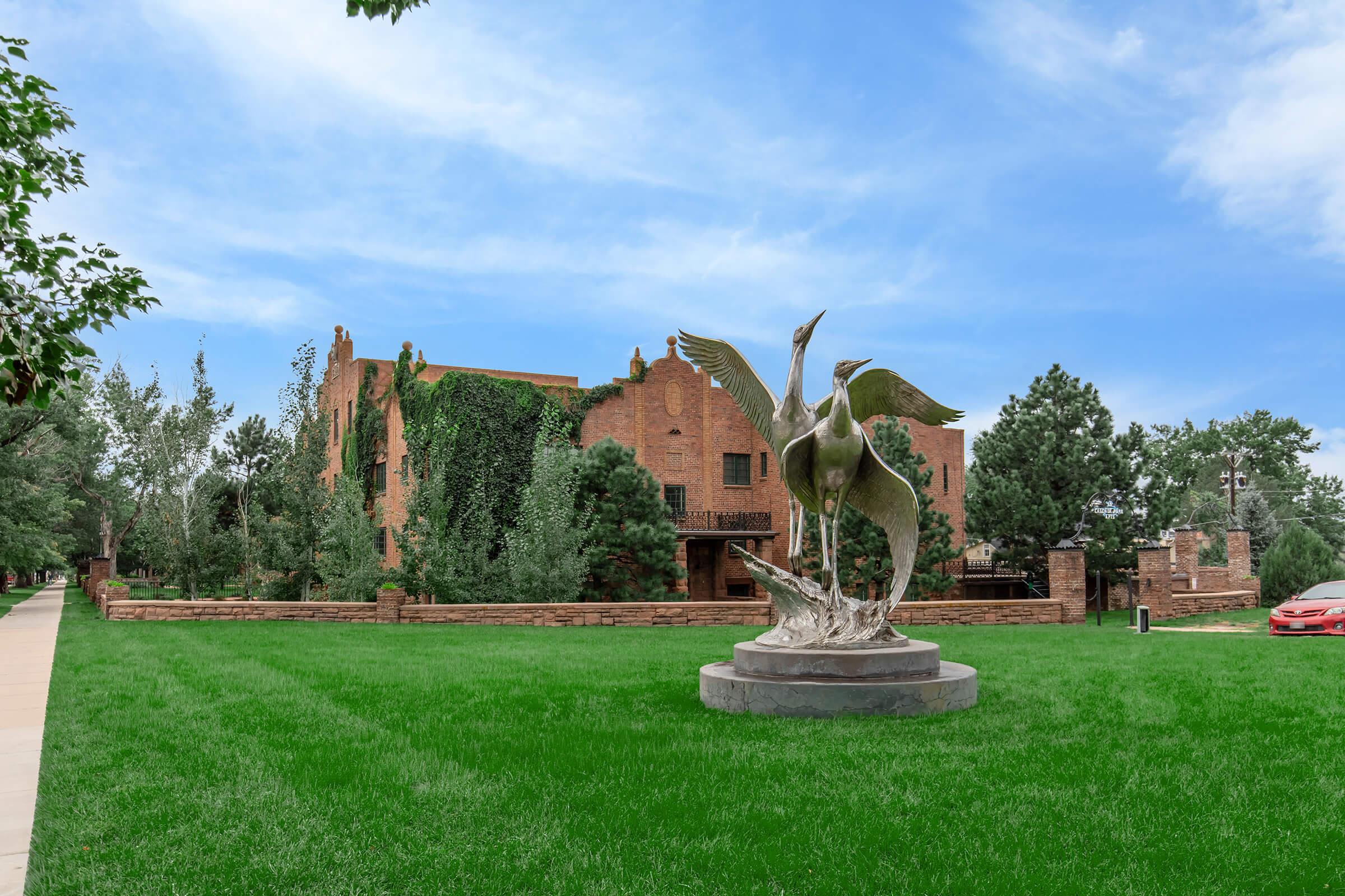 Exterior view of open space with sculpture at Cascade Park in Colorado Springs, Colorado