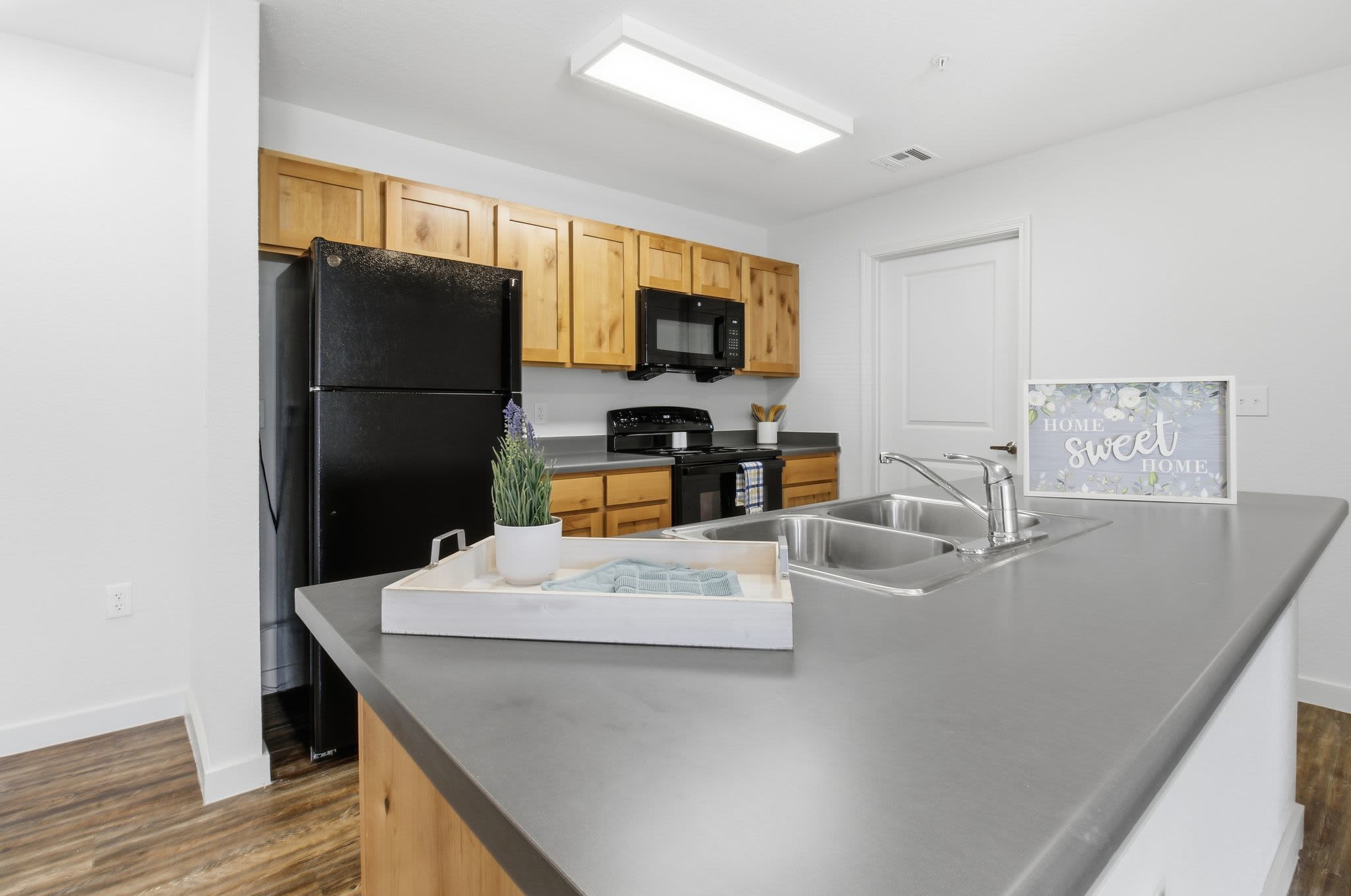 Kitchen with cabinetry at Butler Park in Andrews, Texas