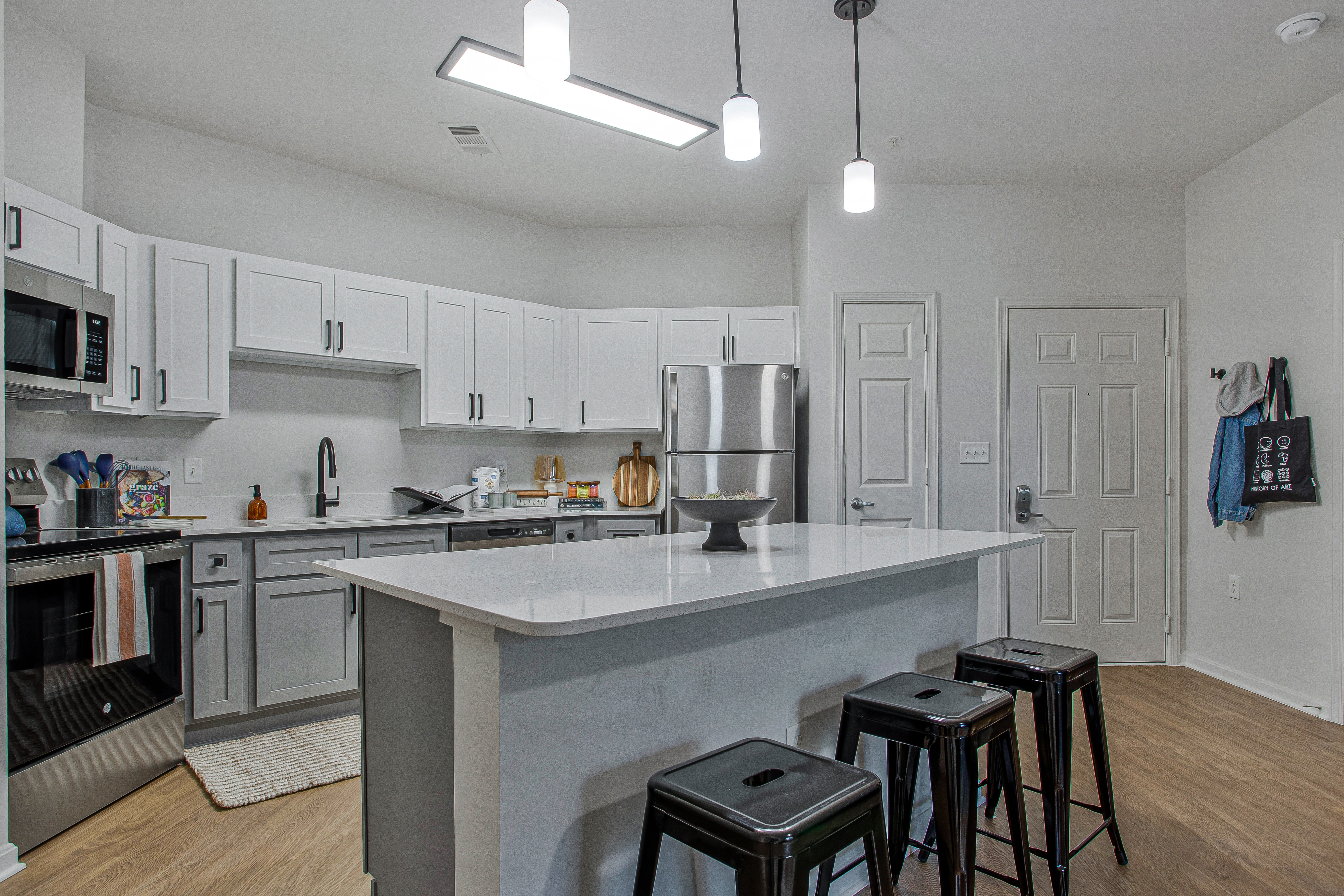 Kitchen with lighting and chairs at Mazza Grandmarc in College Park, Maryland