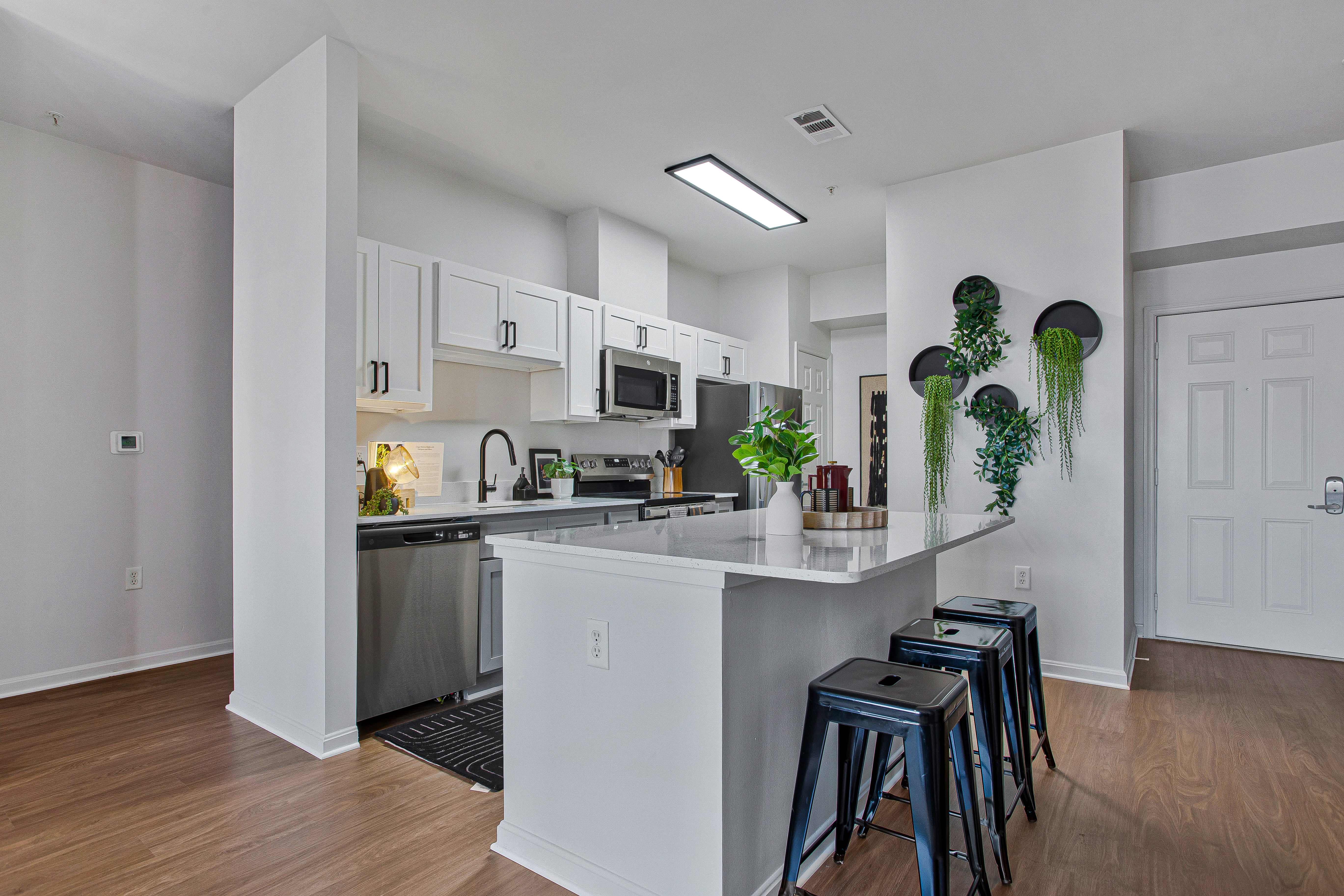 High table with chairs at Mazza Grandmarc in College Park, Maryland