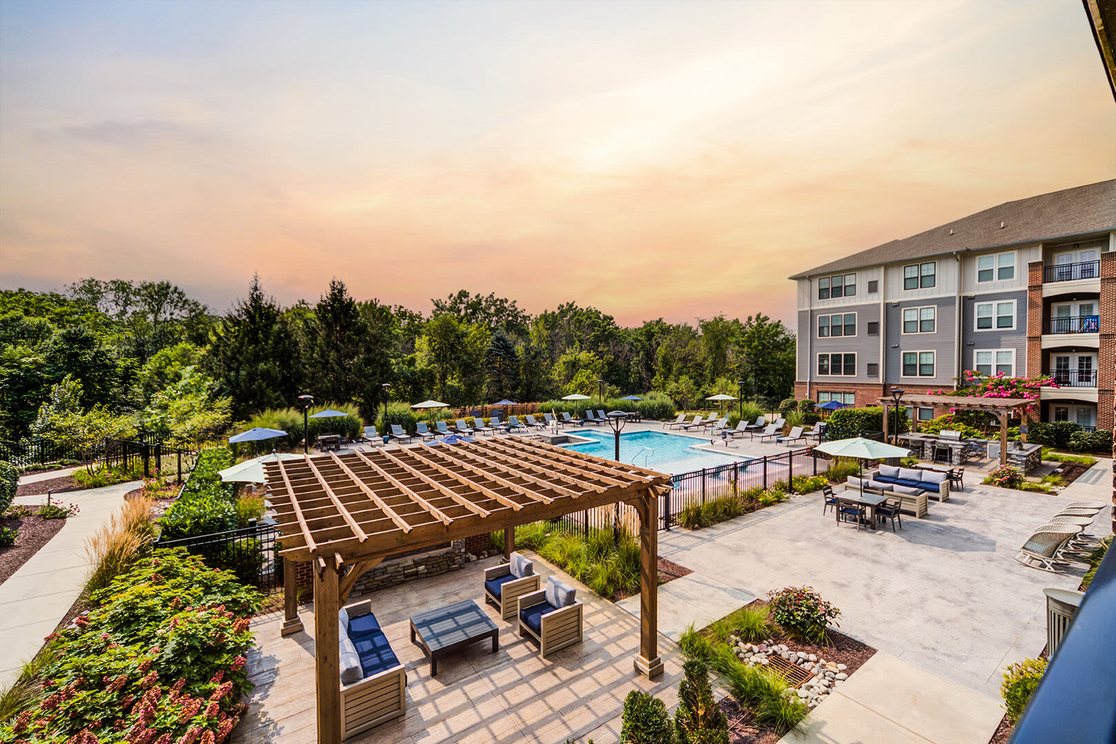 Aerial view of the pool and outdoor lounge area at J Creekside at Exton in Exton, Pennsylvania