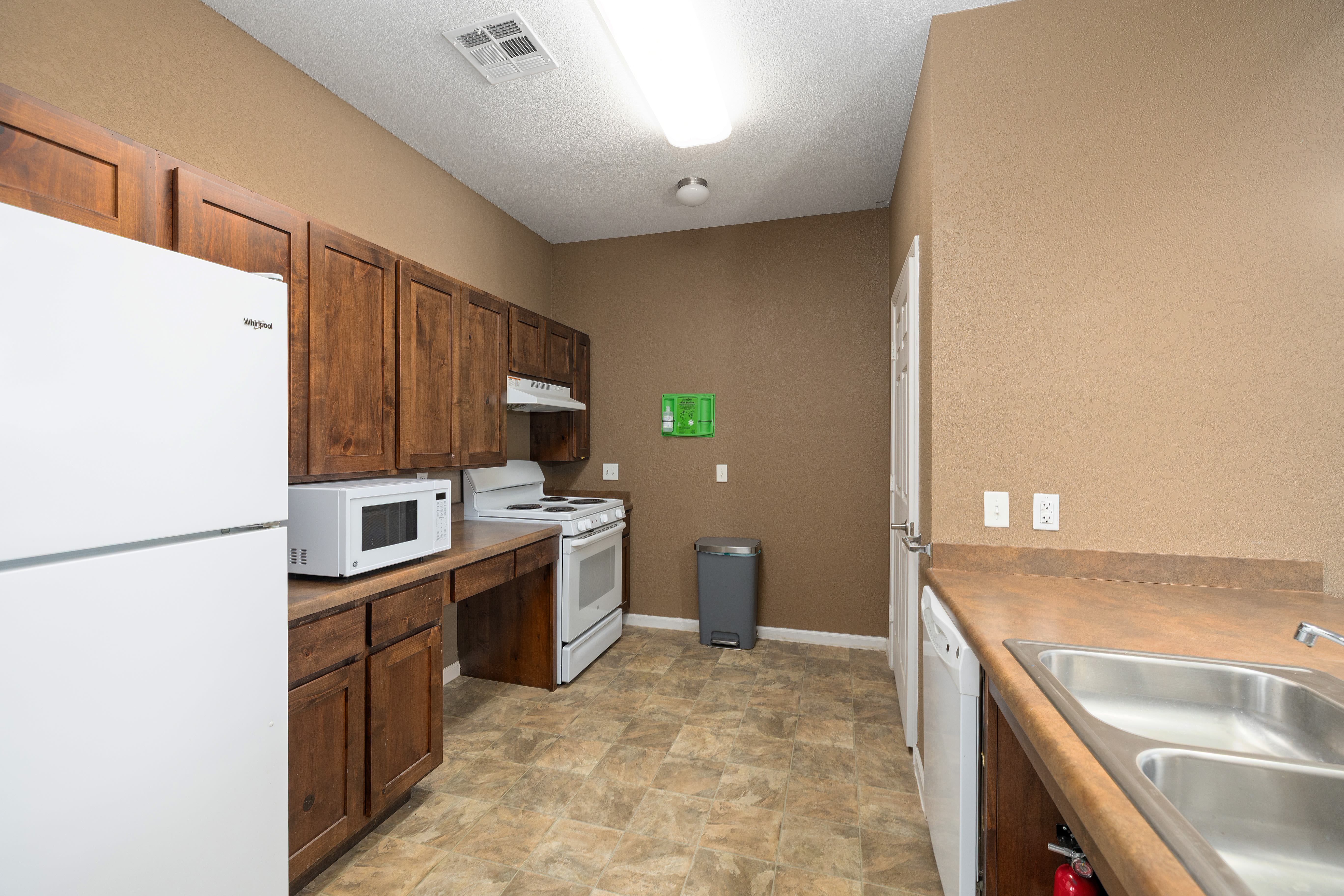Well-lit kitchen at Ridgeway Villas At The Legends in Raymore, Missouri