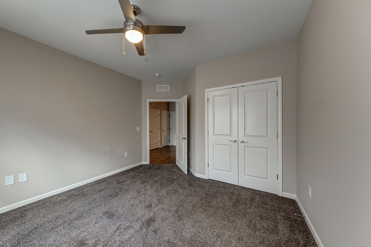 Unfurnished bedroom with a closet at Mallalieu Pointe in East Point. GA