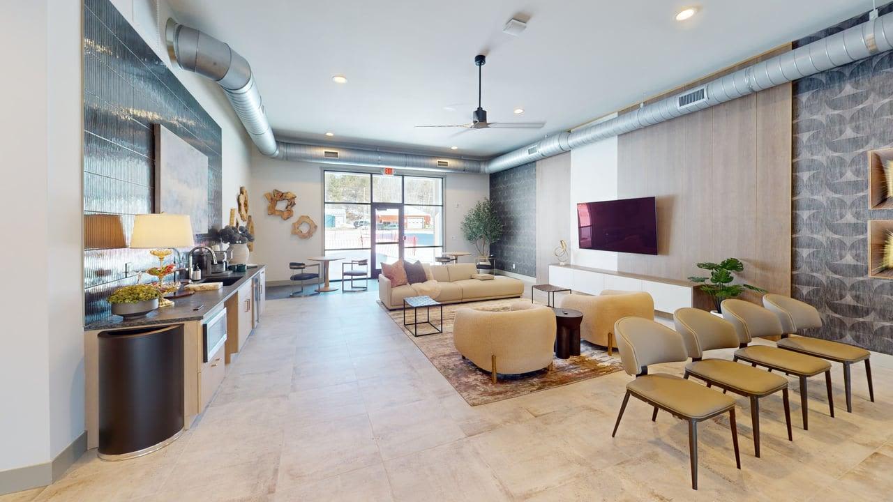 Cozy space with chairs and tables at The Block at Petoskey in Petoskey, Michigan