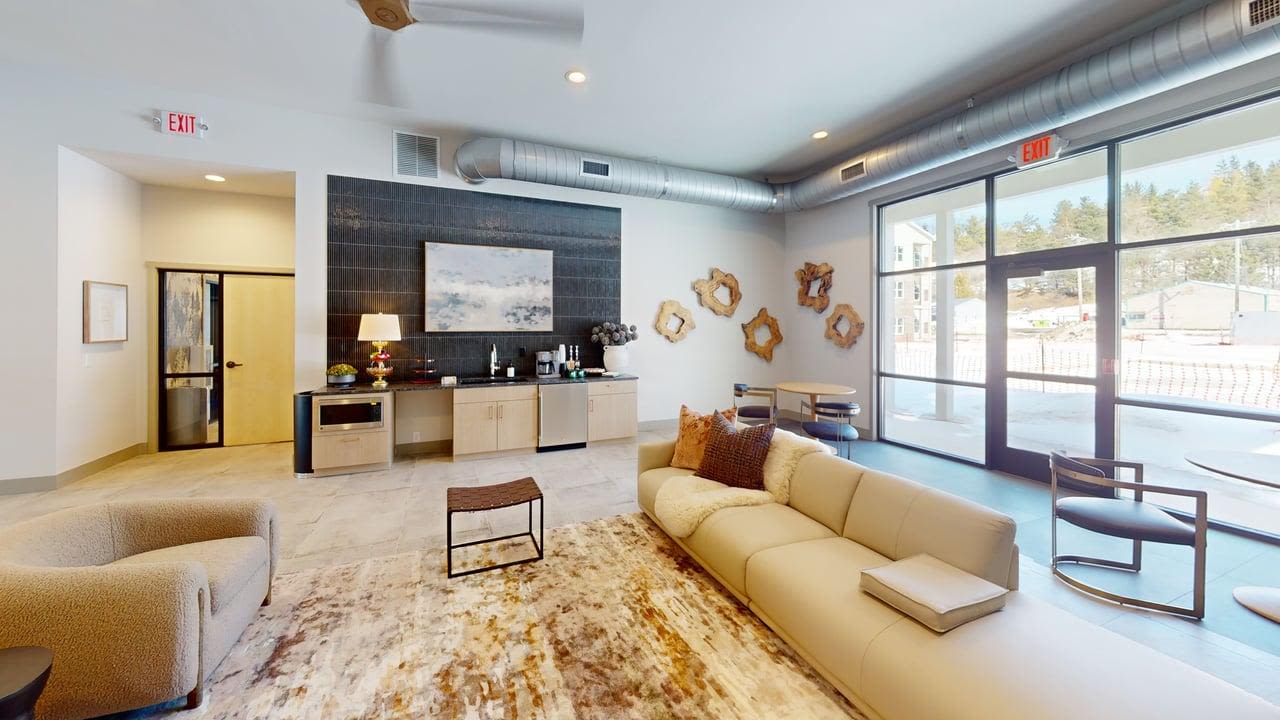 Lounge with tables and chairs at The Block at Petoskey in Petoskey, Michigan