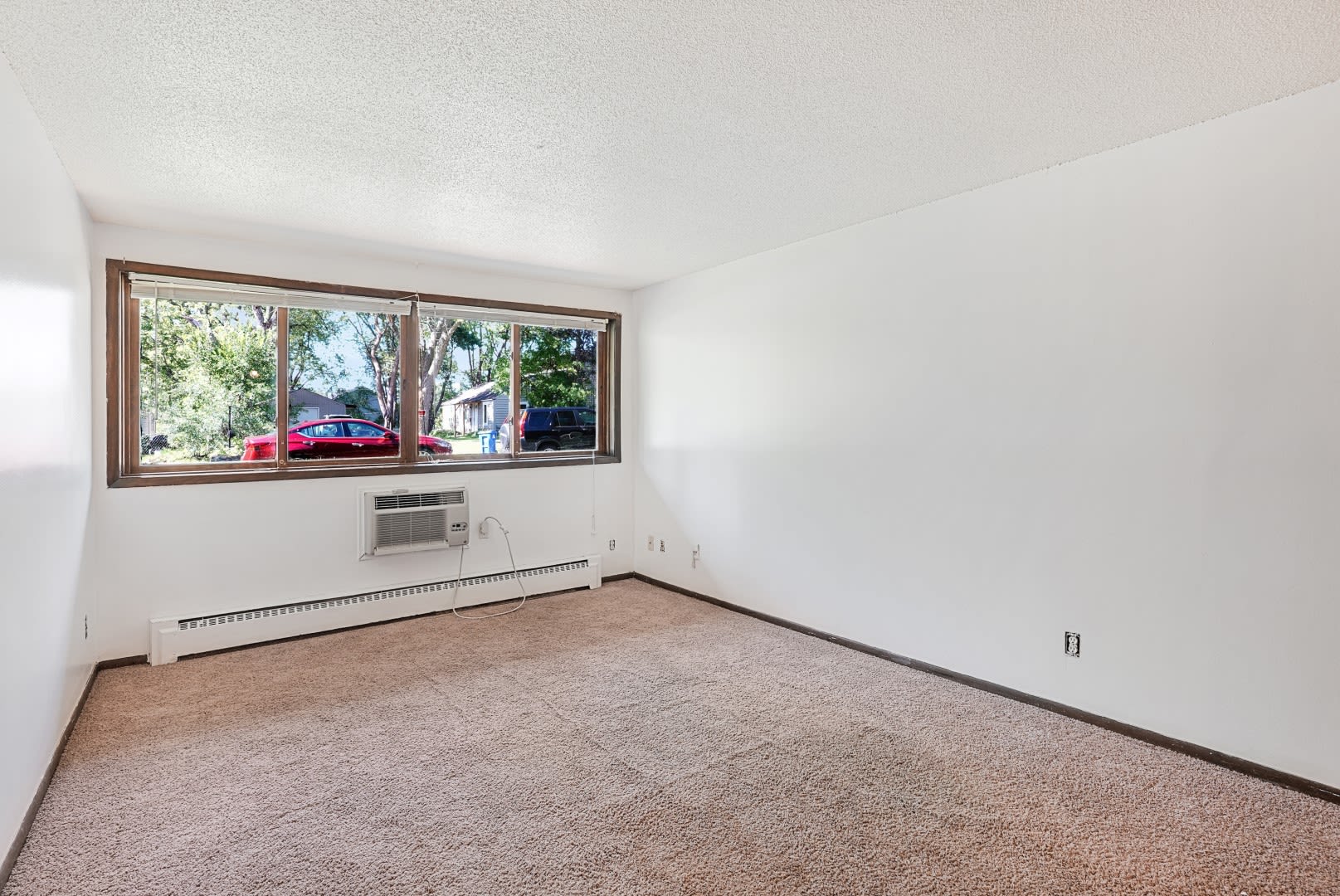 Peaceful master bedroom at Larpenteur Villa in Saint Paul, Minnesota