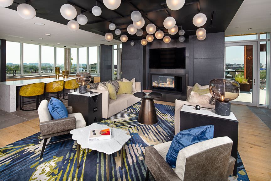Clubhouse with a fireplace at J Linea in Washington, District of Columbia