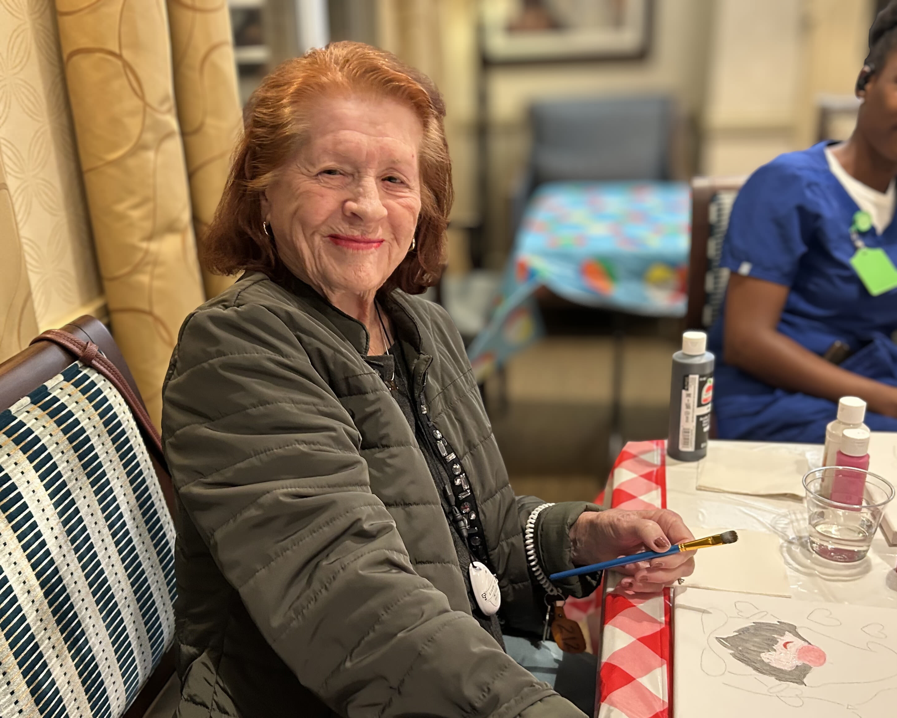 Smiling woman at an event at Glenncrest at Decatur in Decatur, Georgia