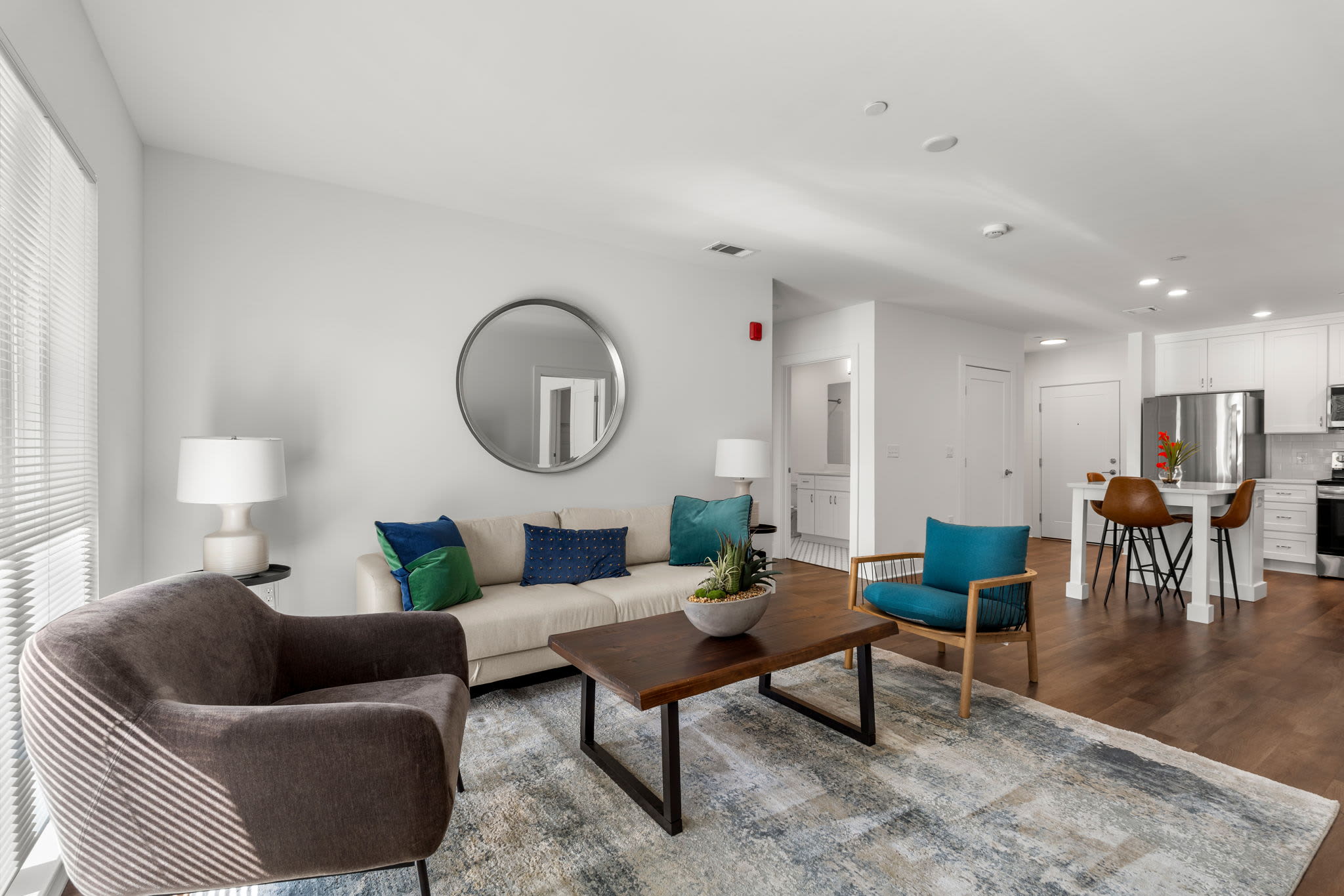 Living area with cozy chairs at Middleborough Station in Middleborough, Massachusetts