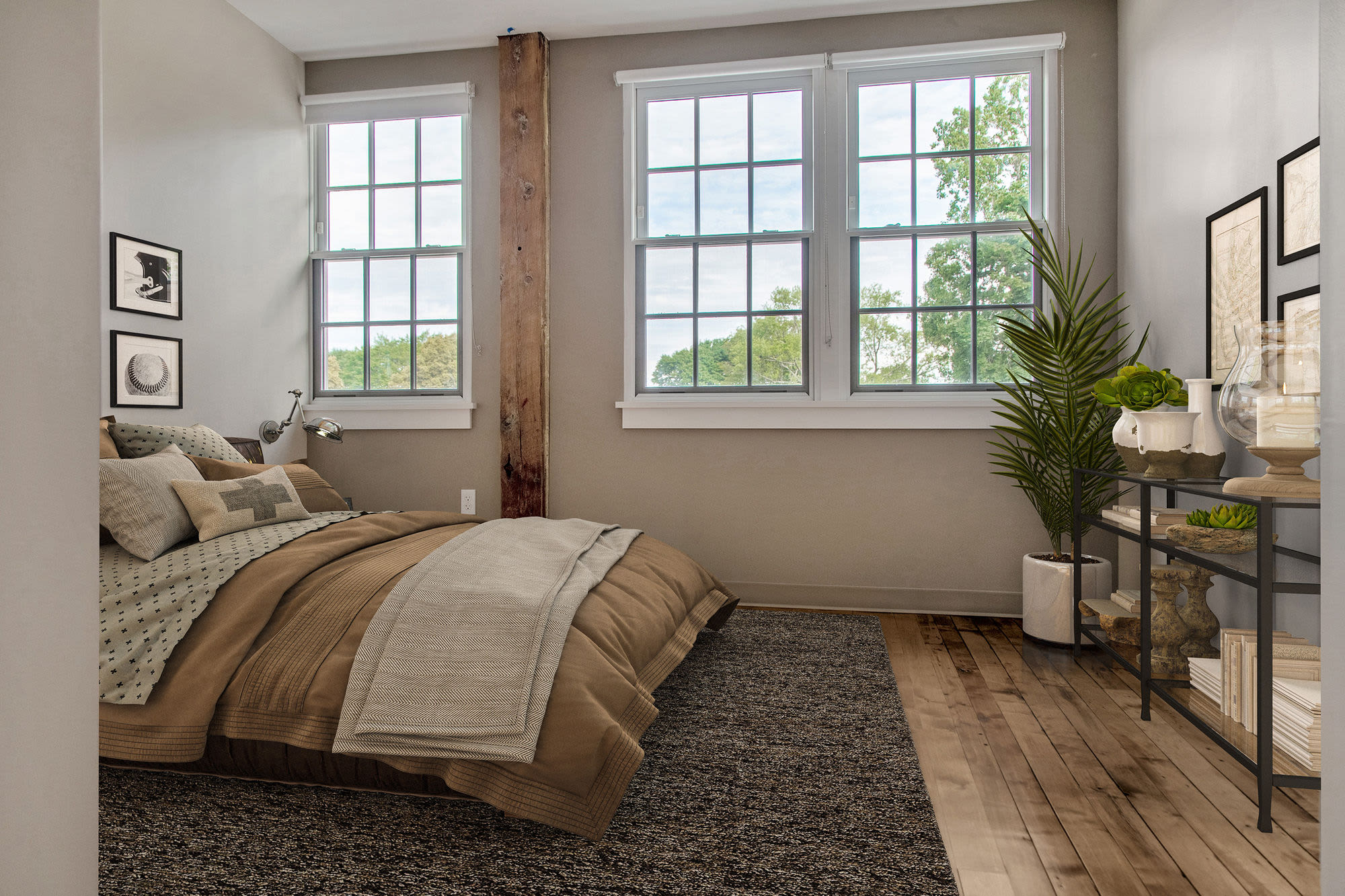 Cozy bedroom with windows at Shoe Shop Place in Middleboro. MA