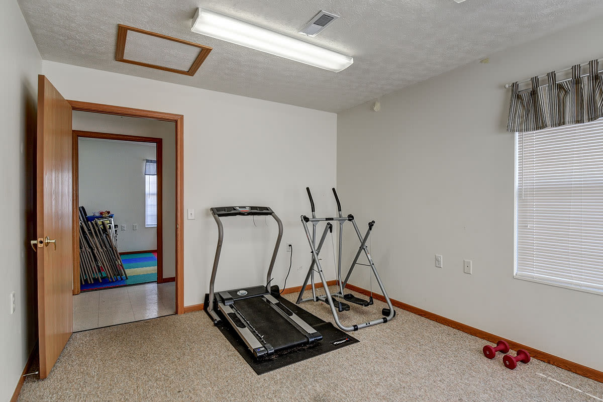 Community room with treadmill at Heathermoor II in Weirton, West Virginia