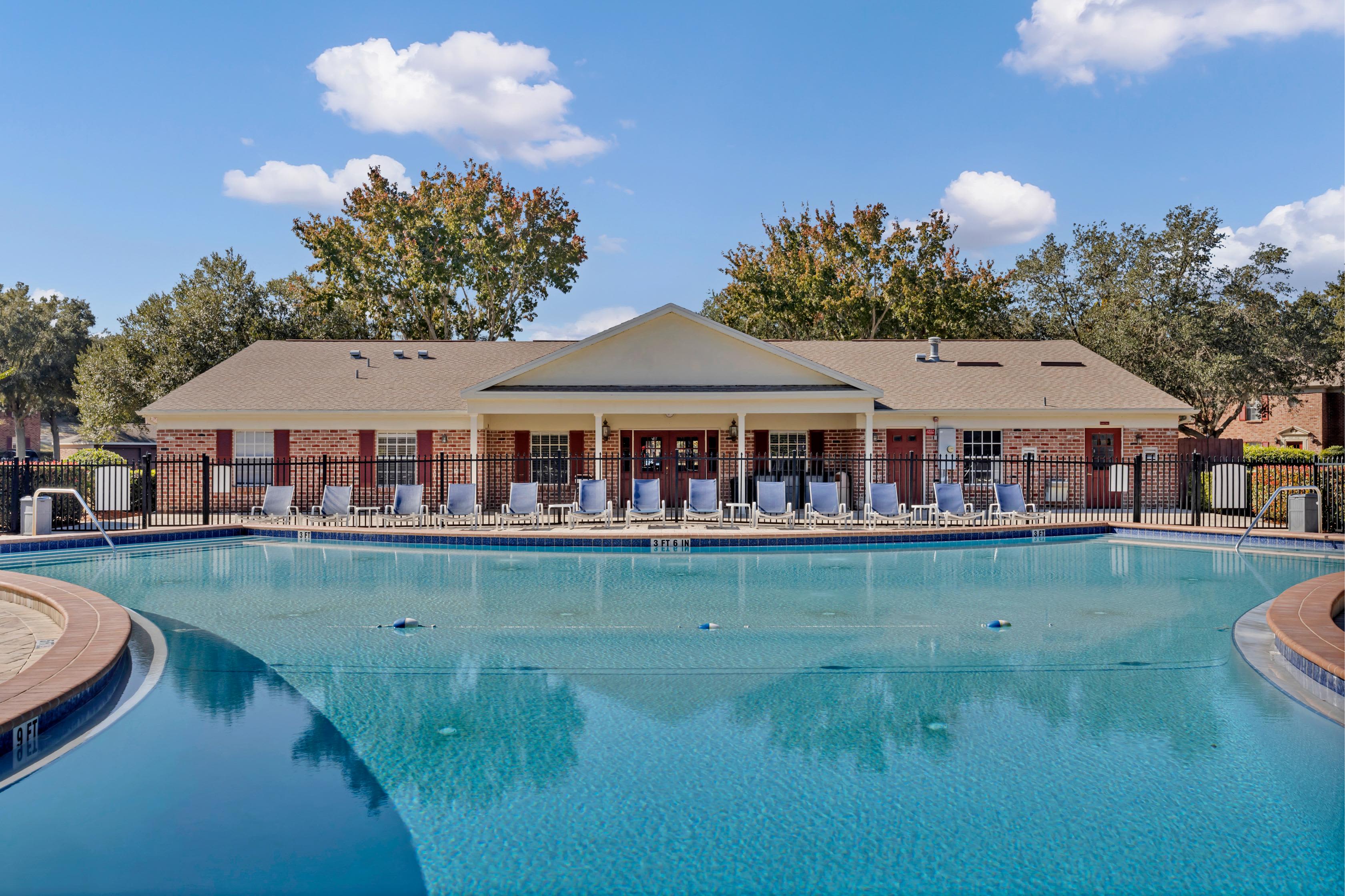 Community swimming pool at Carlton Arms Of Ocala in Ocala, Florida