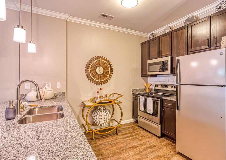 Stainless steel refrigerator and range at Ascot Point Village in Asheville, North Carolina
