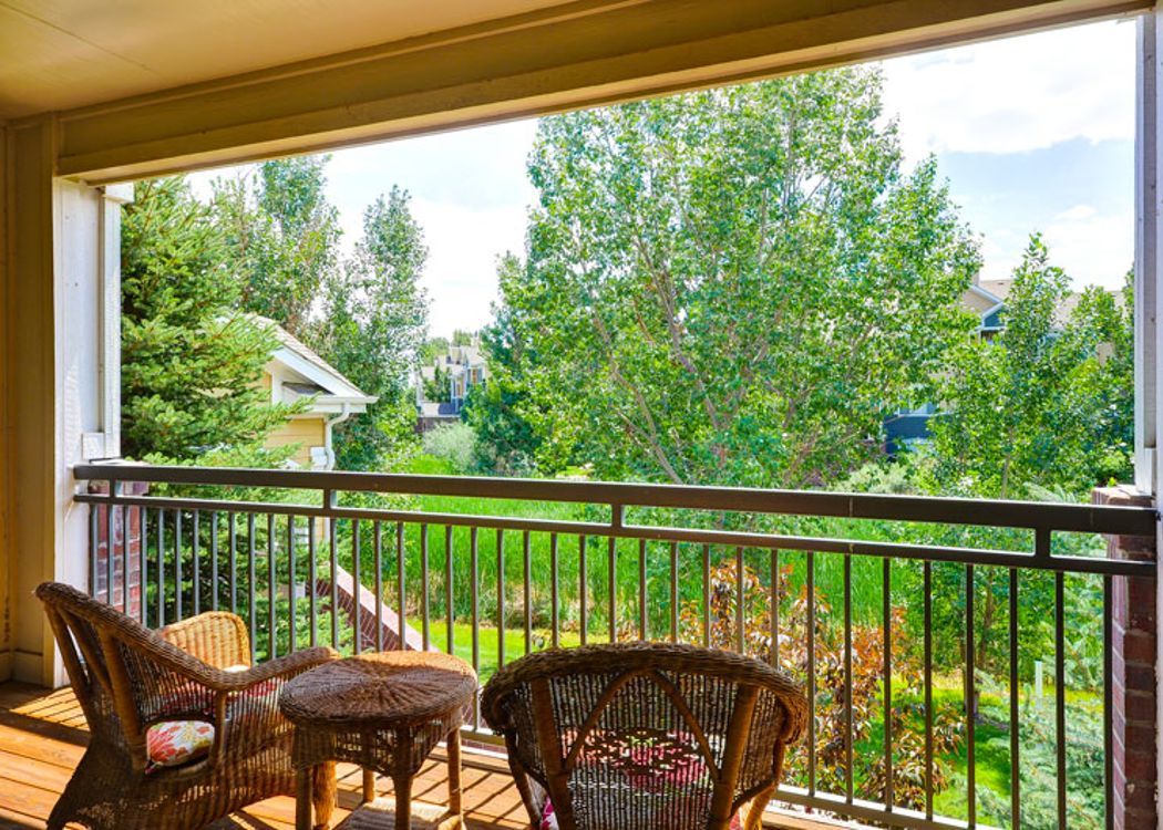 Patio area at Legend Oaks Apartments in Aurora, Colorado