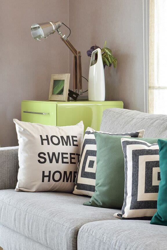 Living room with a couch at Borden Place Apartments in Fall River, Massachusetts