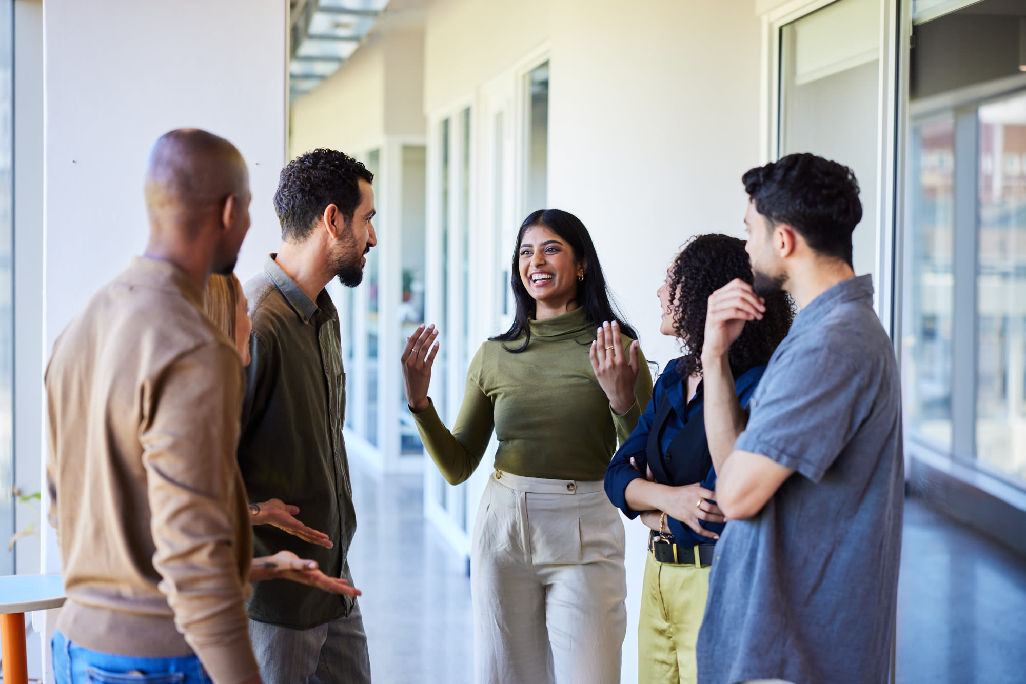 Team meeting with a group of diverse individuals
