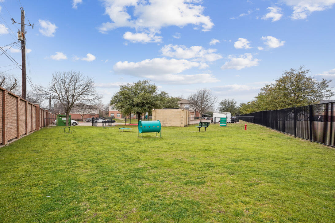 Dog park with grass at Mission Eagle Pointe in Allen, Texas, 