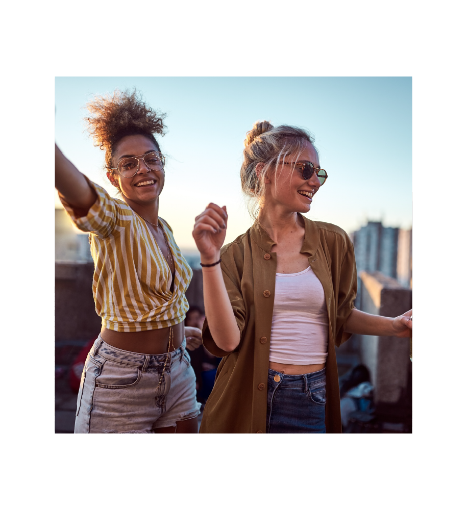 Two women posing for a picture at Oldham & Worth in Raleigh, North Carolina