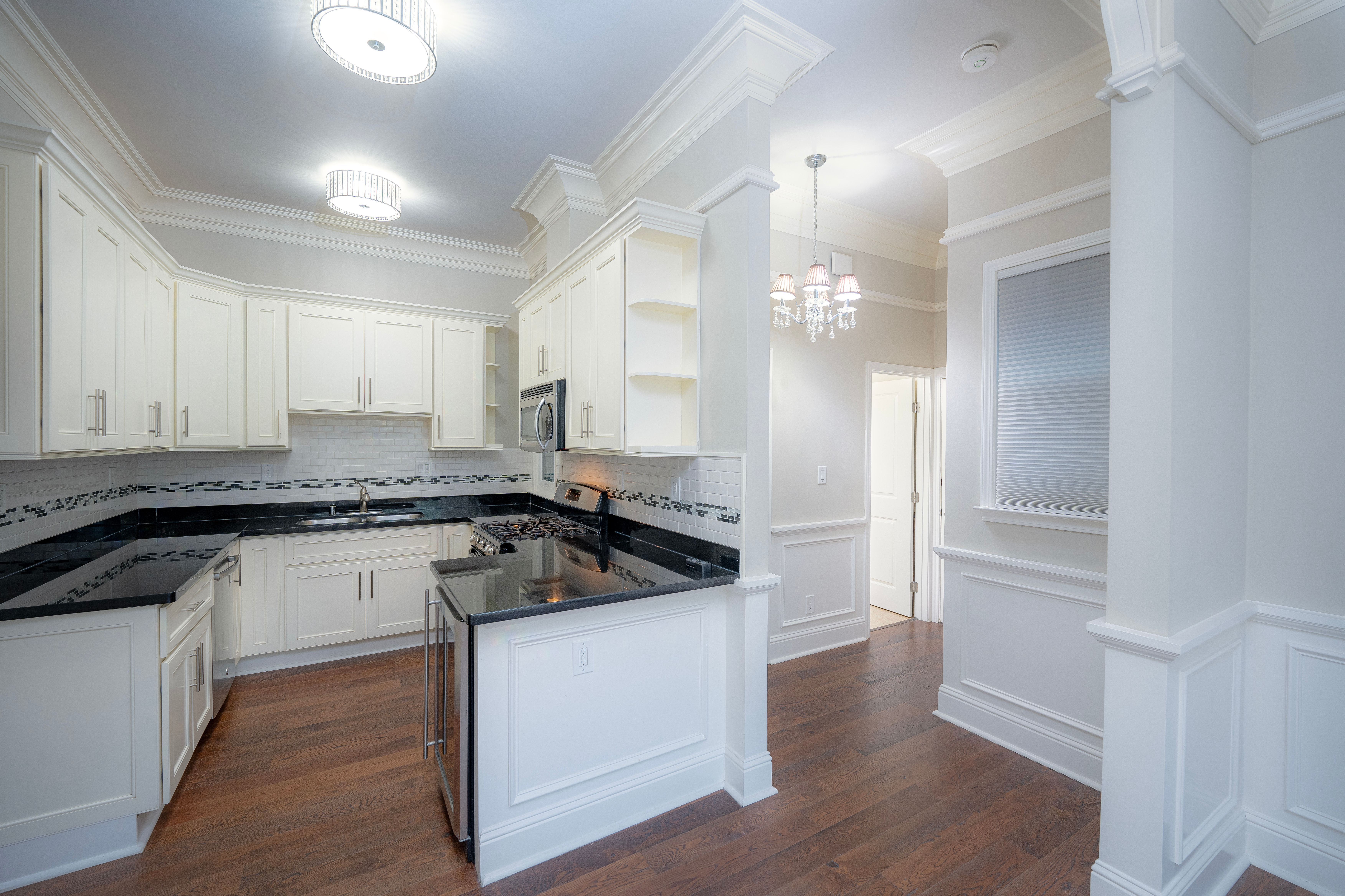 Modern kitchen with island and stainless steel appliances