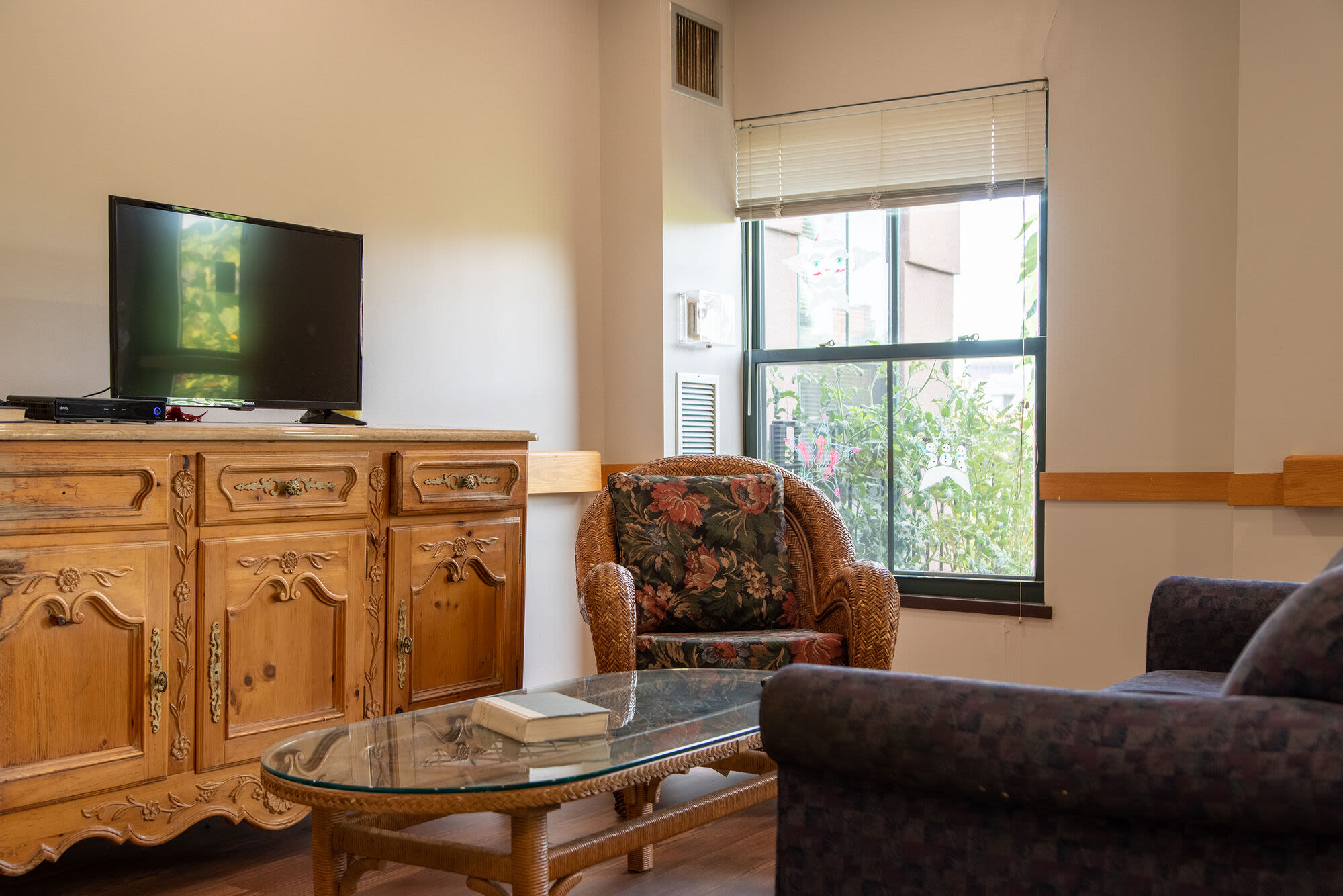 Television and coffee table at Hearth Anna Bissonnette House in Boston, Massachusetts