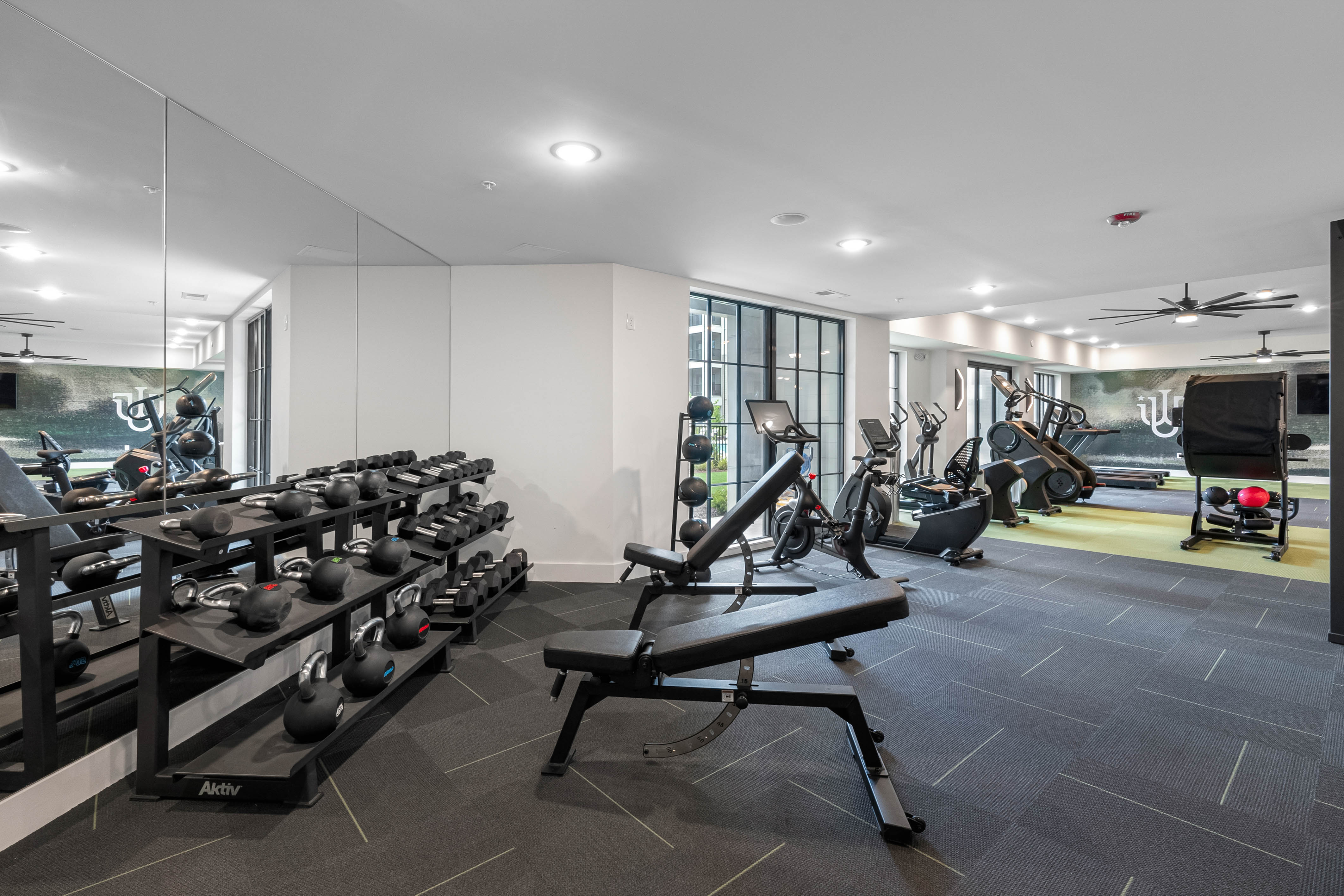 Gym with modern equipment at Westport Lofts in Belville, North Carolina