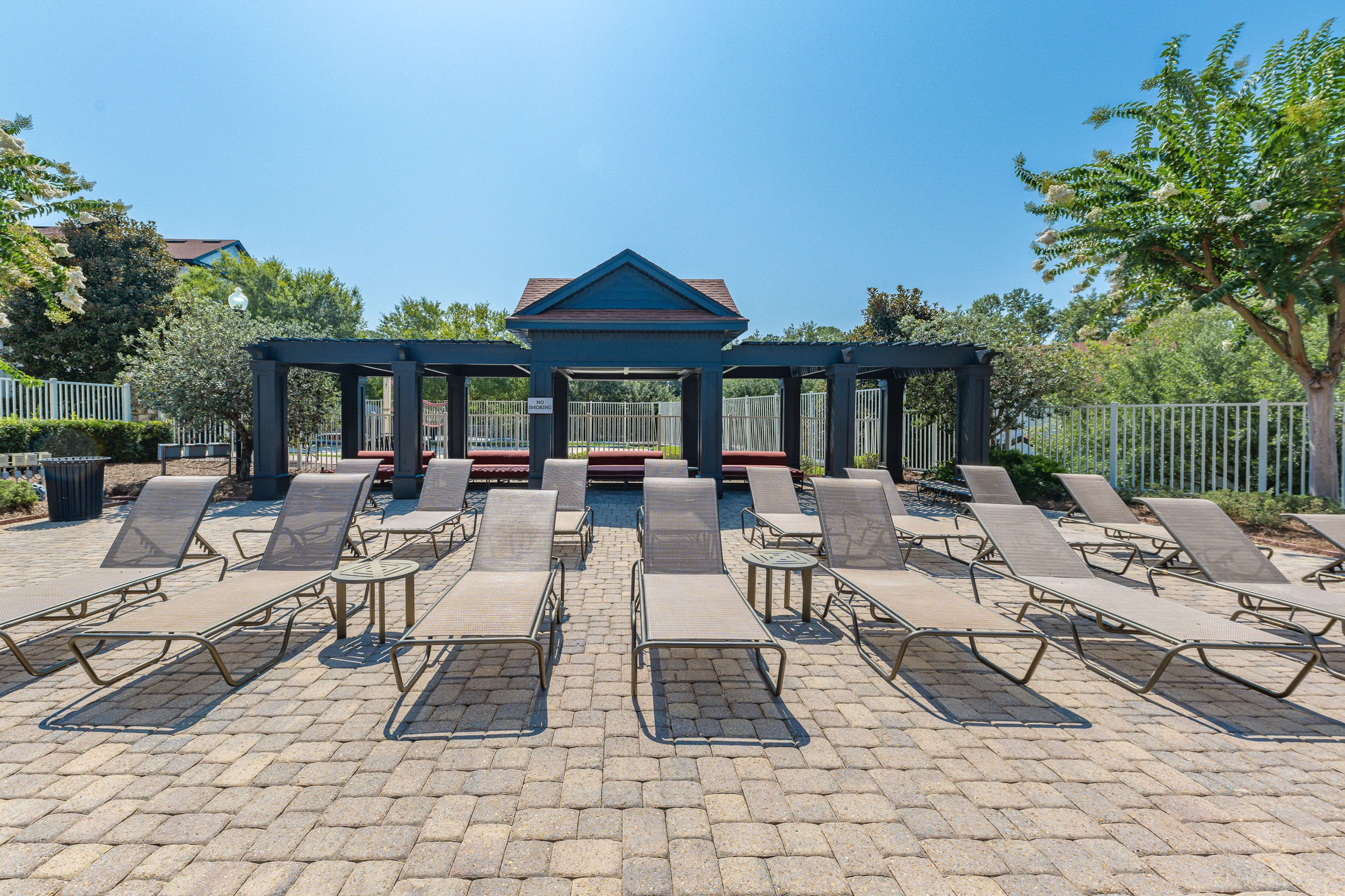 Chairs near the pool area at Century Capital City in Tallahassee, Florida