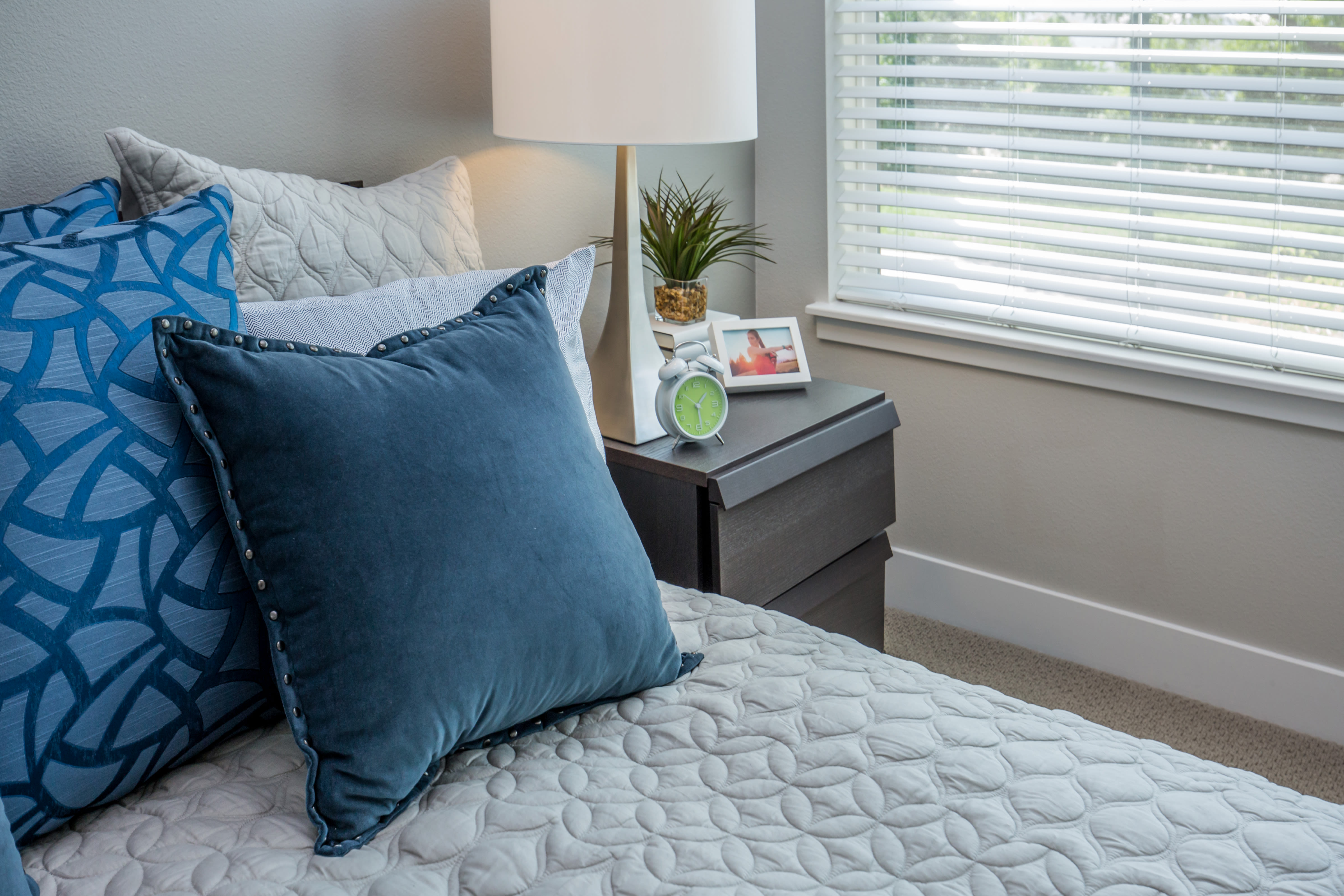 Pillows in the bed at Park Place Olde Town Apartments in Arvada, Colorado