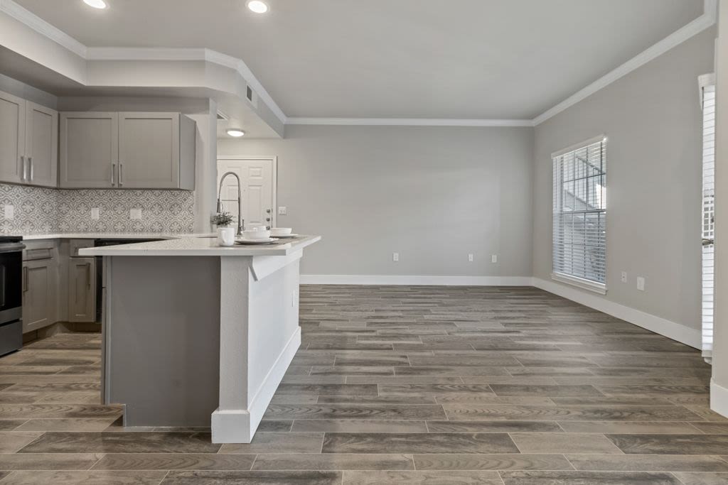 Unfurnished living area and kitchen at Charleston in San Antonio,Texas