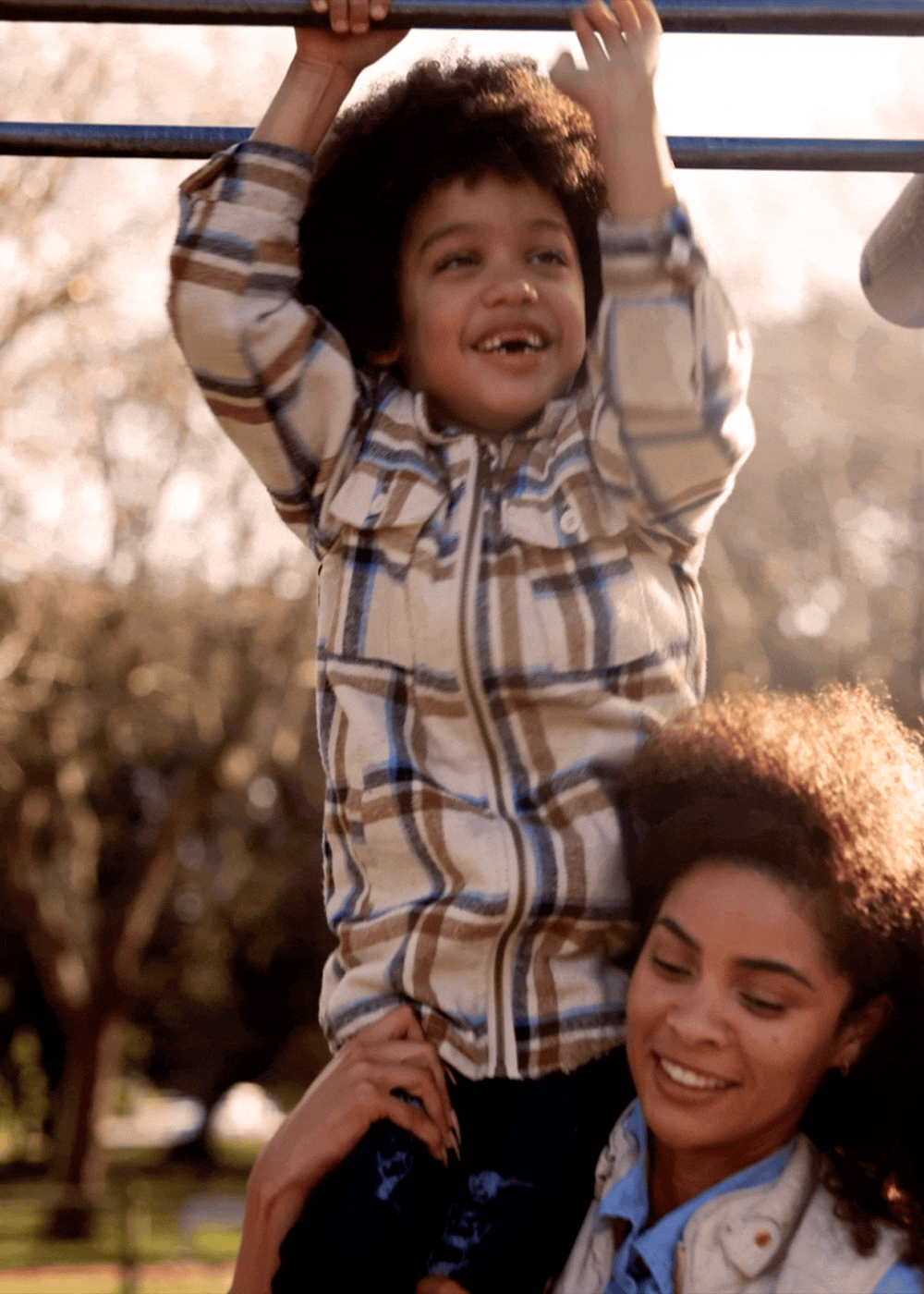 Resident kid playing with his mother in a playground at The Indie Glendale Collection in Glendale, California