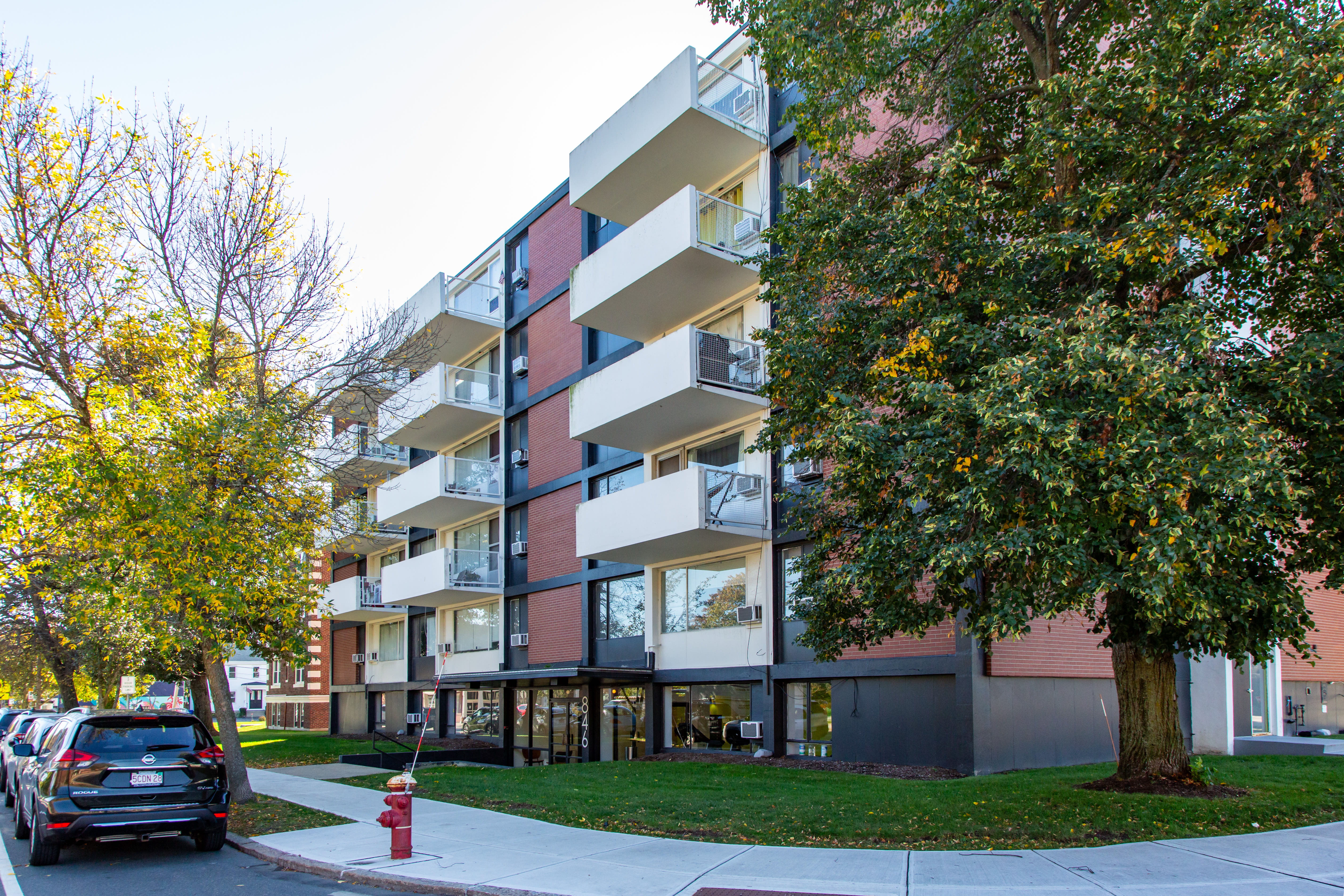Community building with parking at HCA 840-846 Mass Ave in Arlington, Massachusetts
