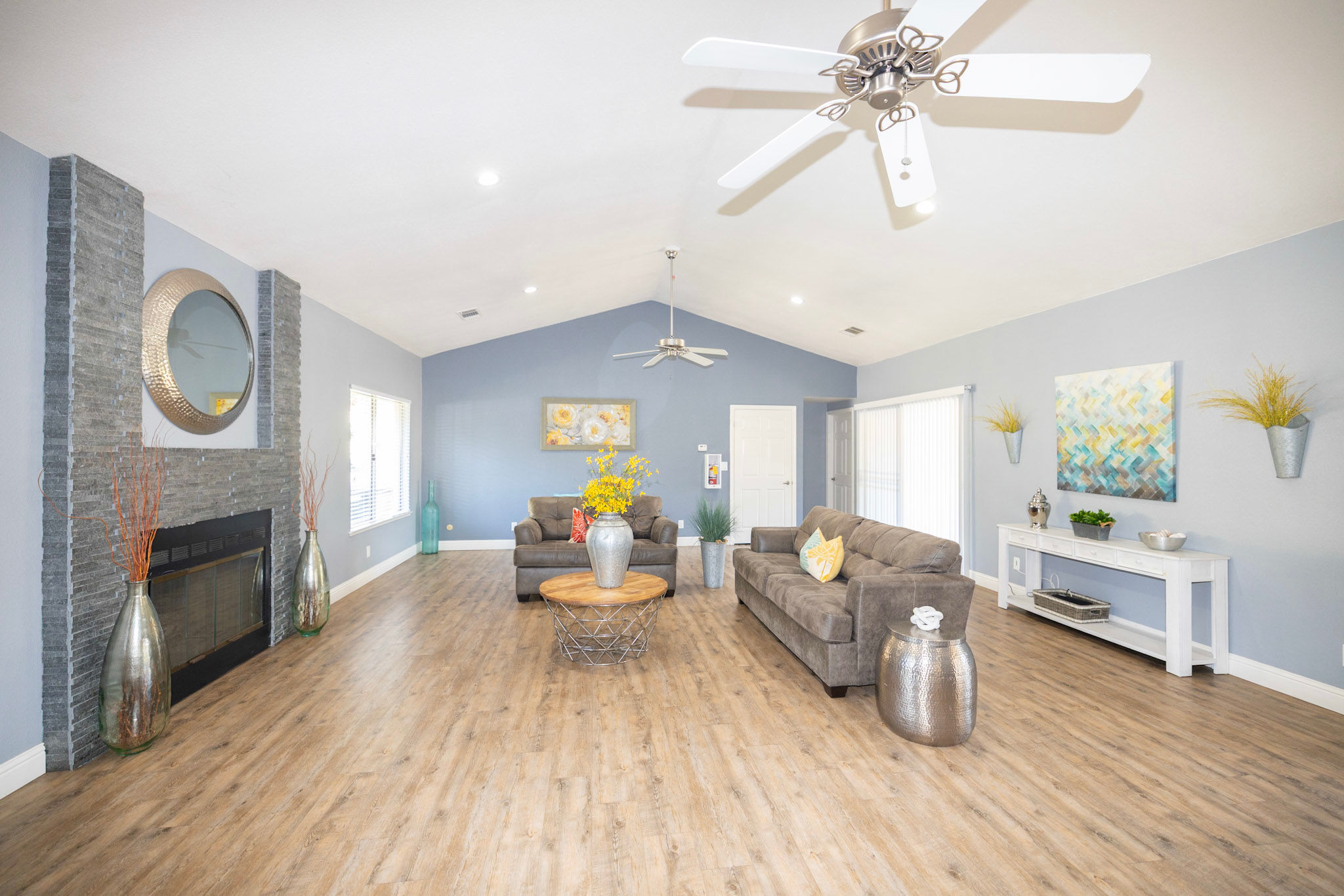 Clubhouse with stylish interiors and a TV at Terrace View Apartments in Fresno,California