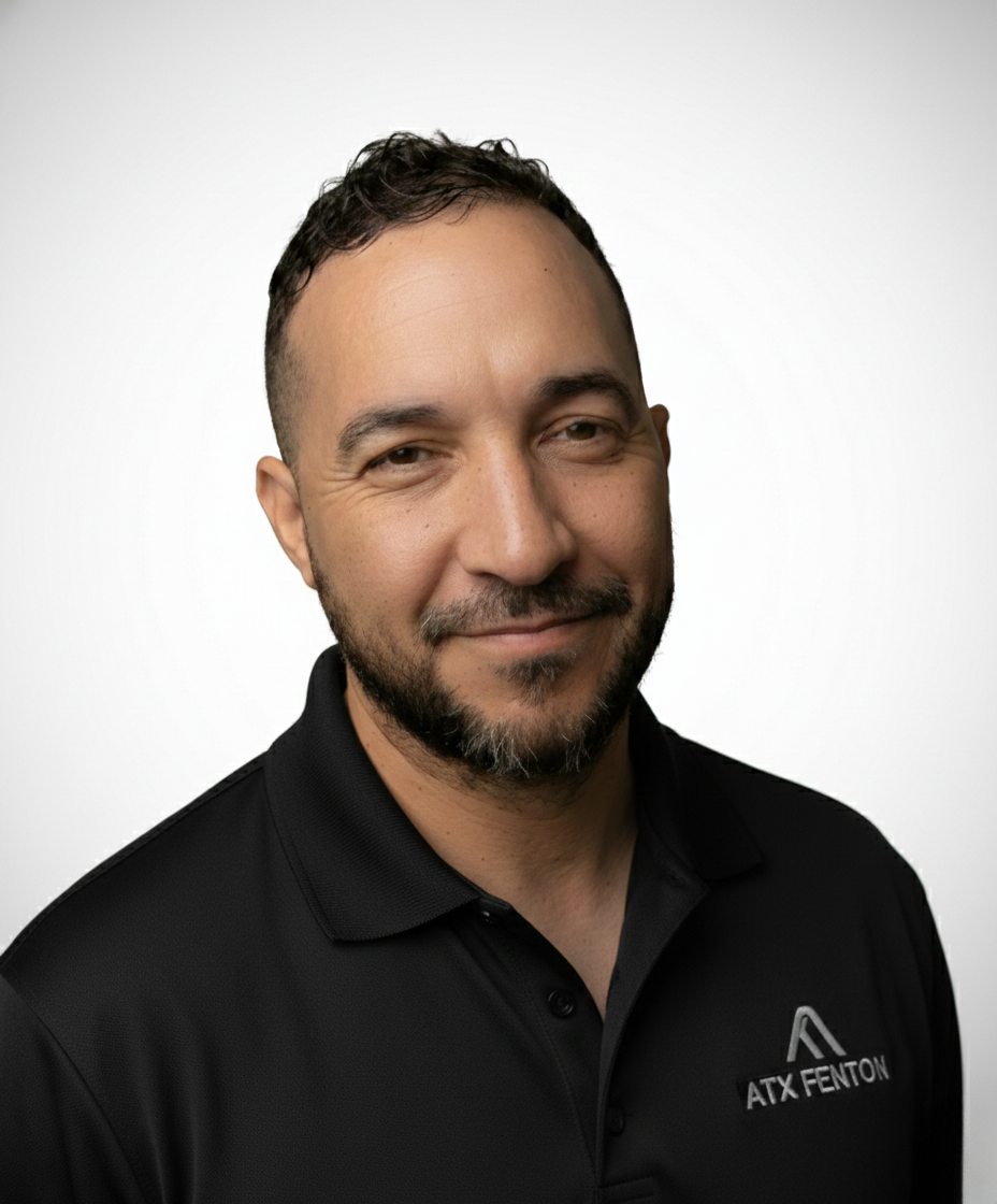 ATX Fenton team member headshot in black polo at ATX Fenton in Austin, Texas