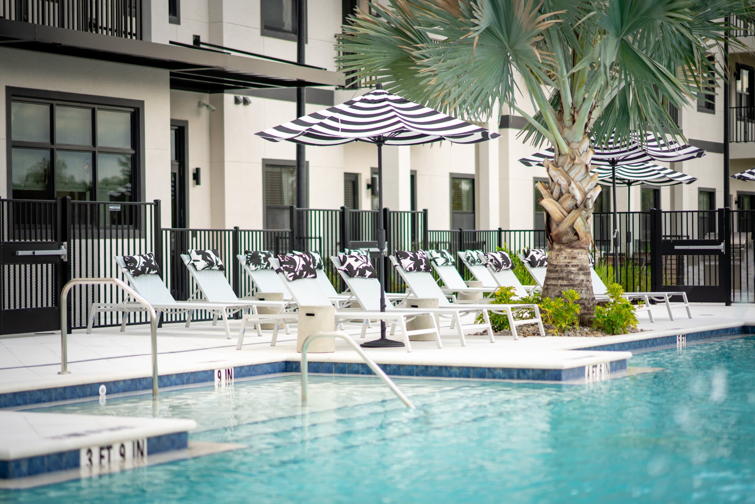 evergreen-pine-island-cape-coral-fl-pool-with-lounge-seating-and-grills