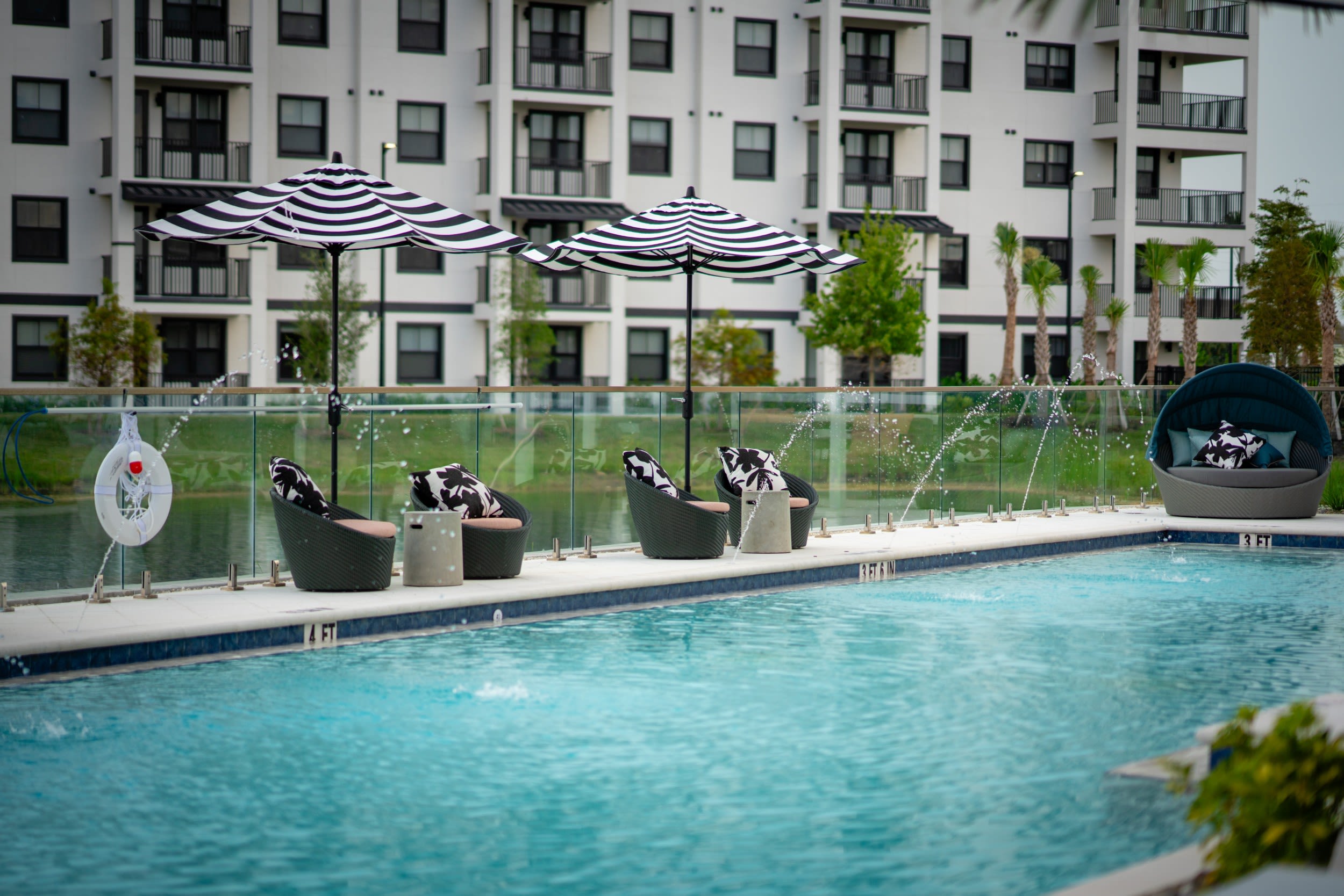 evergreen-pine-island-cape-coral-fl-pool-with-lounge-seating-and-grills
