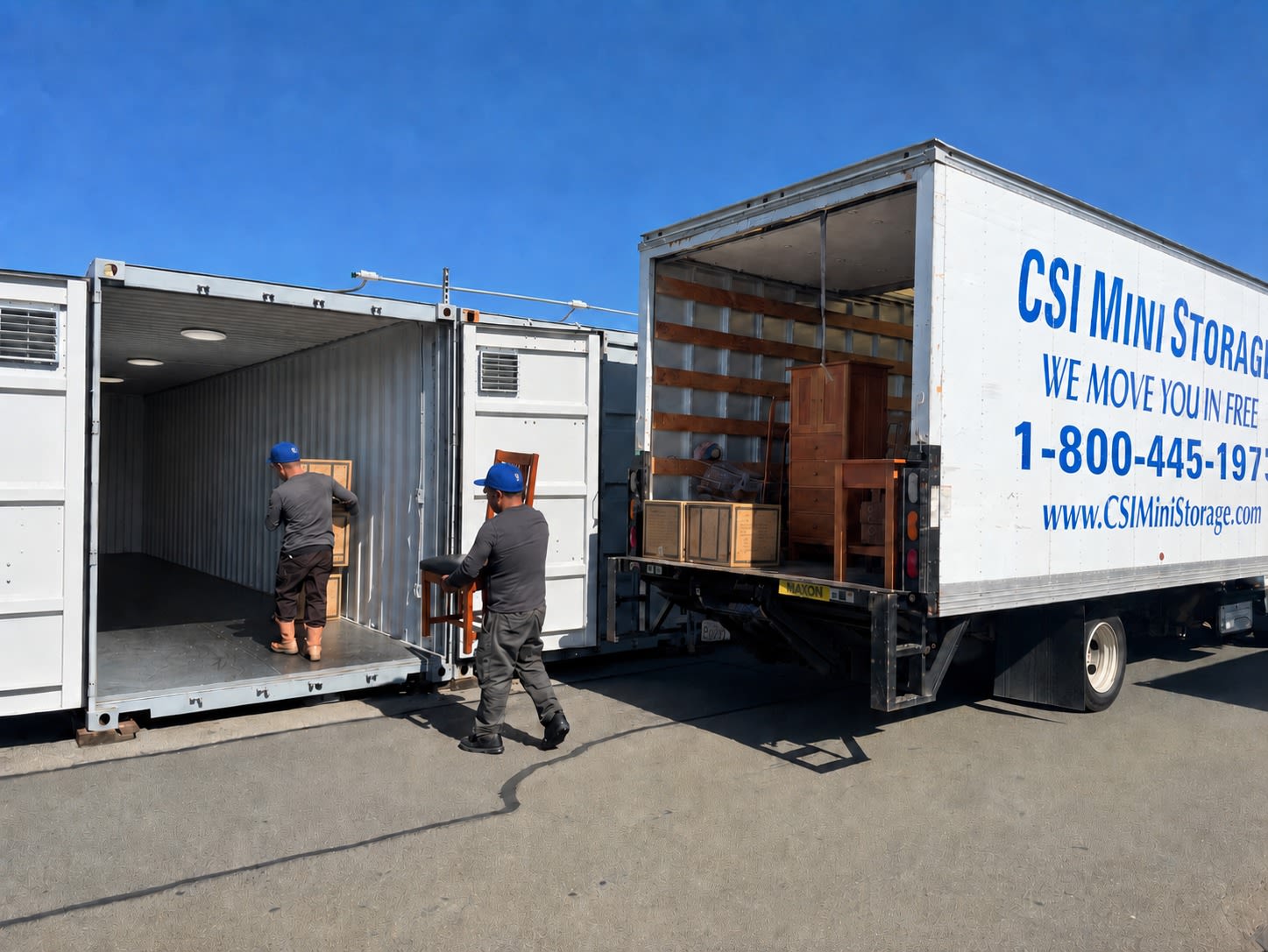 CSI Mini Storage Alameda move-in help team unloading furniture and boxes directly into a drive-up storage unit.