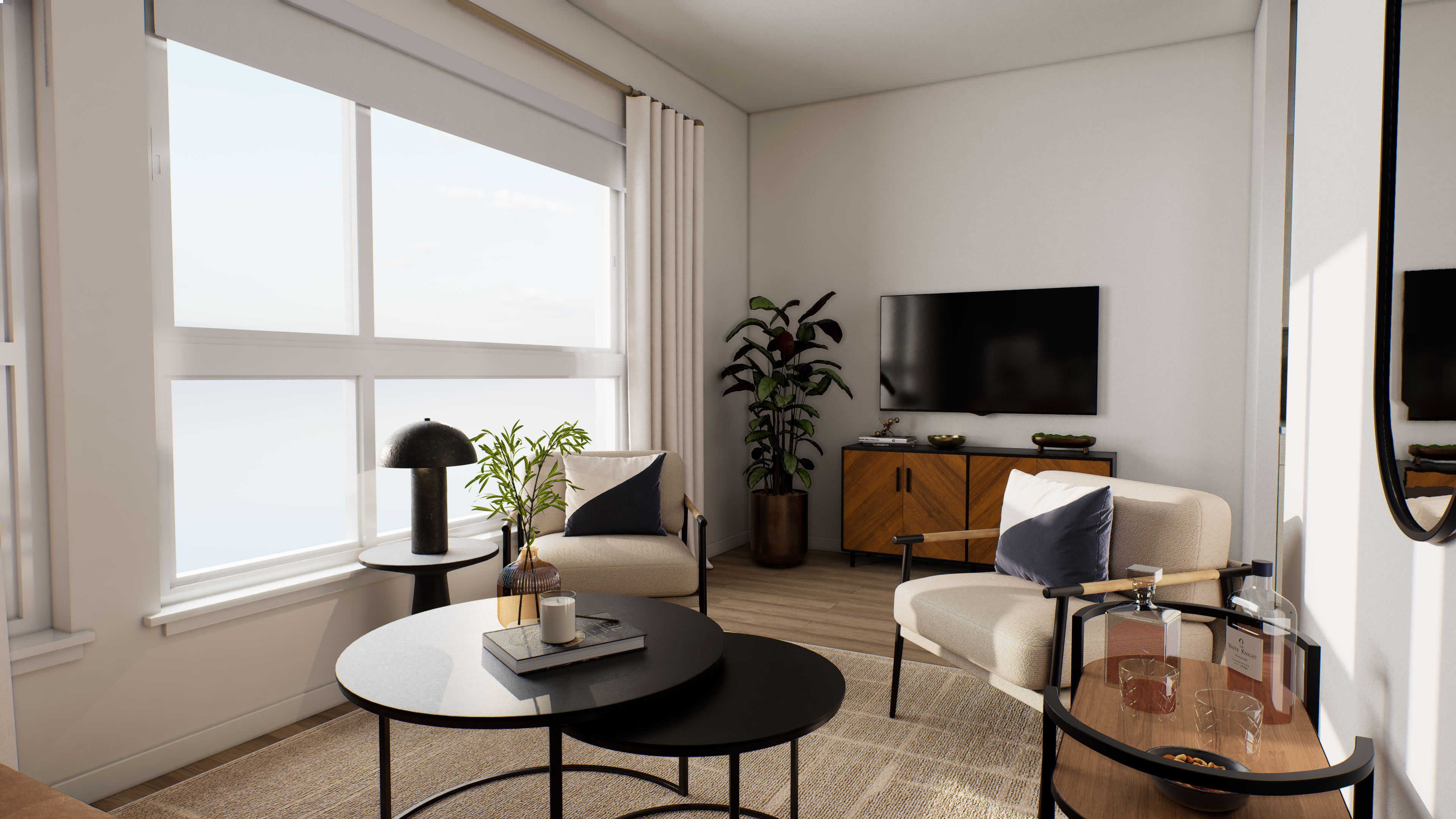 Modern living room with coffee tables and a wall-mounted TV at The Colton in Redwood City, California