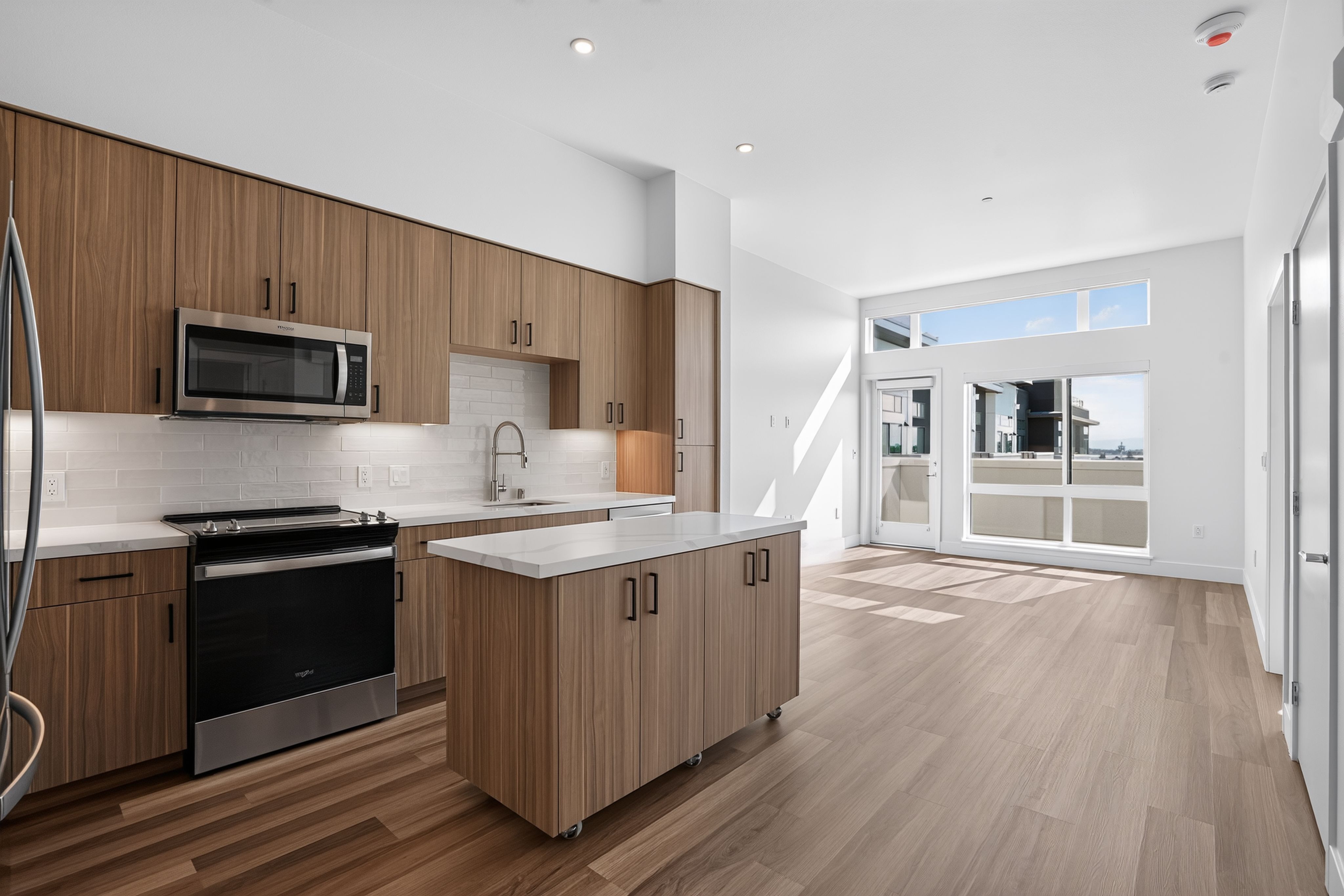 Modern kitchen with stainless steel appliances at The Colton in Redwood City, California