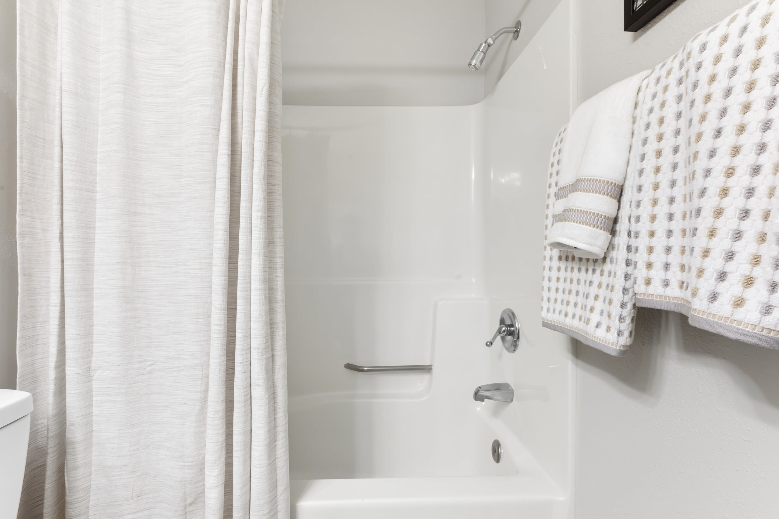Bathroom with large mirror at Reserve South in Richmond, Virginia