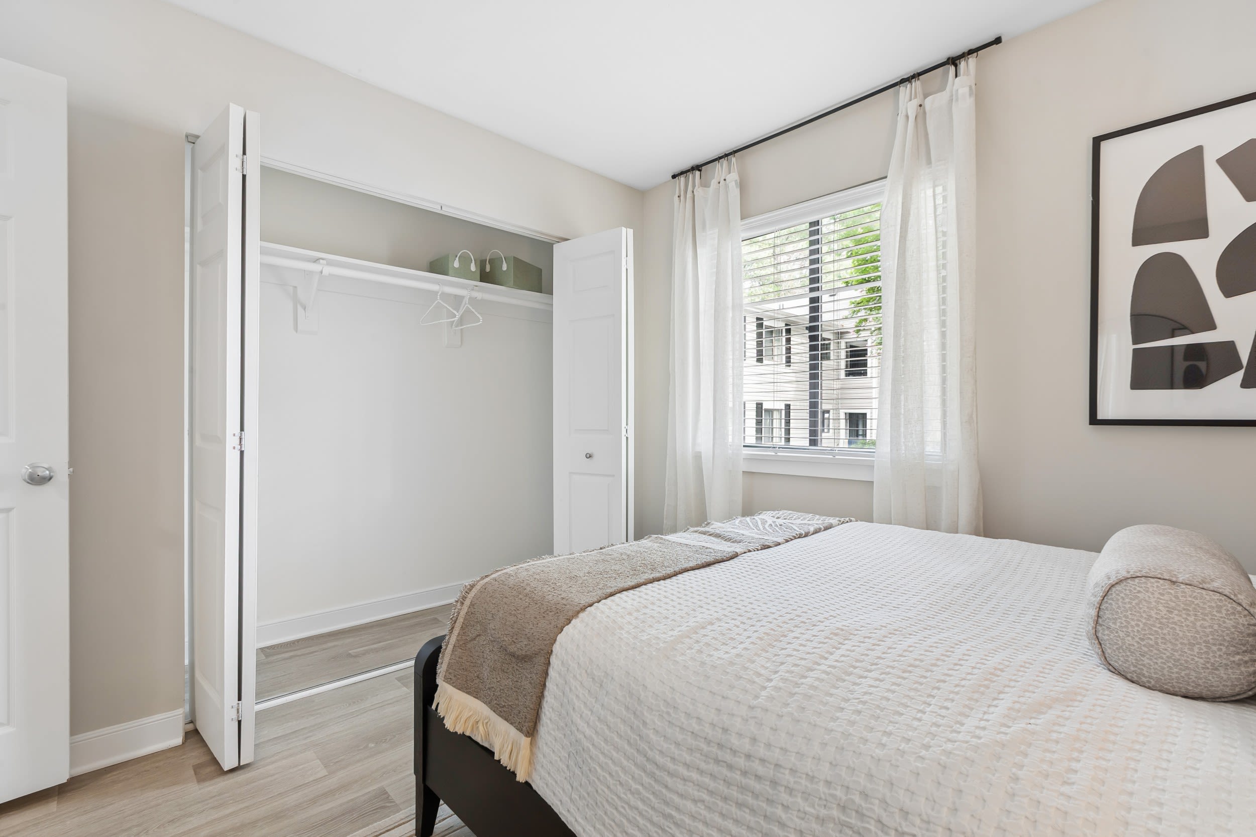 Bedroom with attached closet at Reserve South in Richmond, Virginia