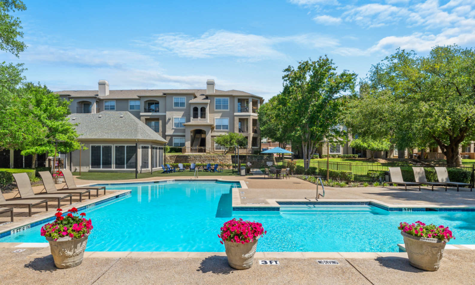 Apartment building photo of Ballantyne Apartments in Lewisville, TX