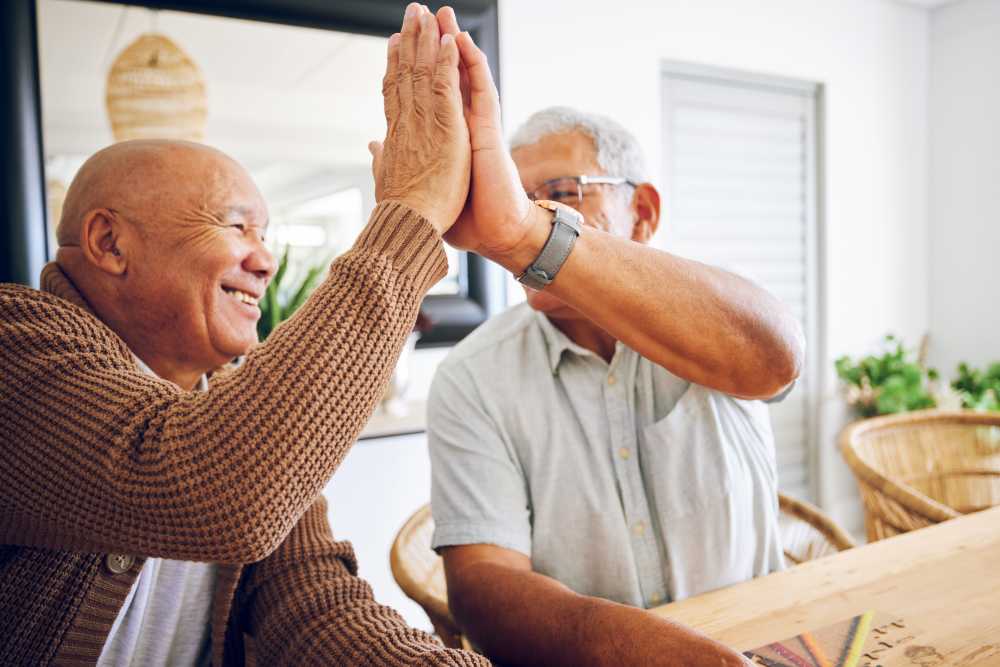 Residents high fiving each other at O'Fallon in O'Fallon, Missouri